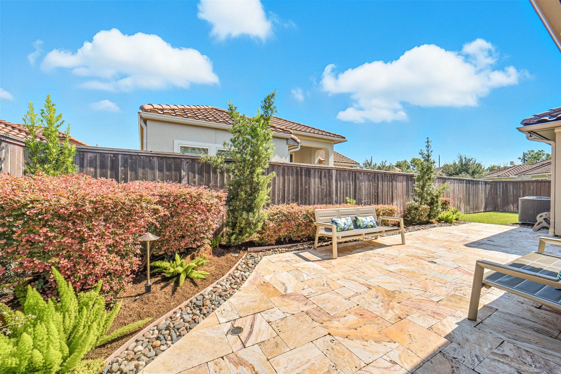 10 Silent Way Drive, Sugar Land, TX 77498 Lovely landscaping enhances the outdoor space.