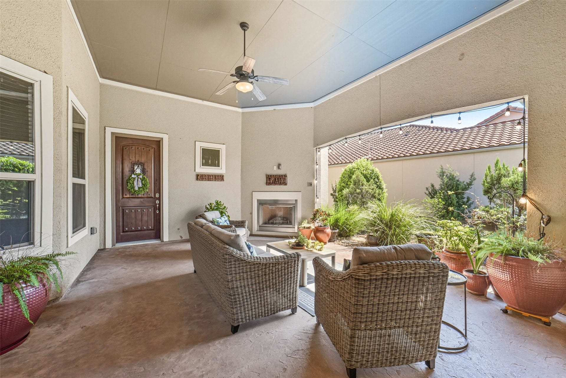 10 Silent Way Drive, Sugar Land, TX 77498 Fabulous secluded and covered patio area, with fireplace, located between the main house and the casita.