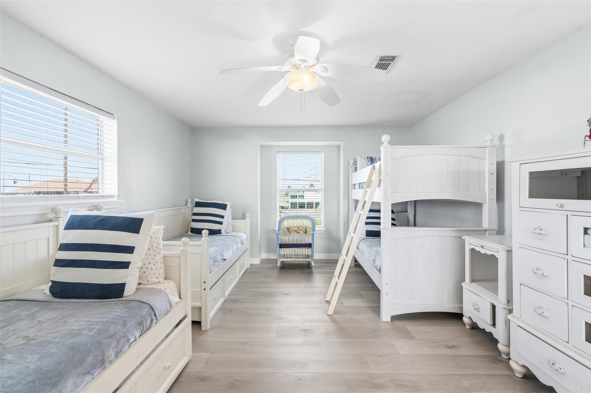 21631 Termini San Luis Pass Road, Galveston, TX 77554 Bright and inviting bedroom featuring twin trundle beds and a bunk bed.