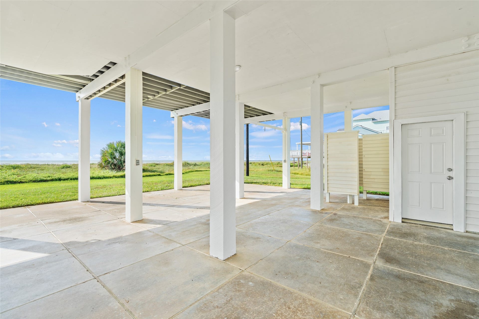 21631 Termini San Luis Pass Road, Galveston, TX 77554 Spacious covered patio/parking area. Ideal for outdoor relaxation and gatherings.