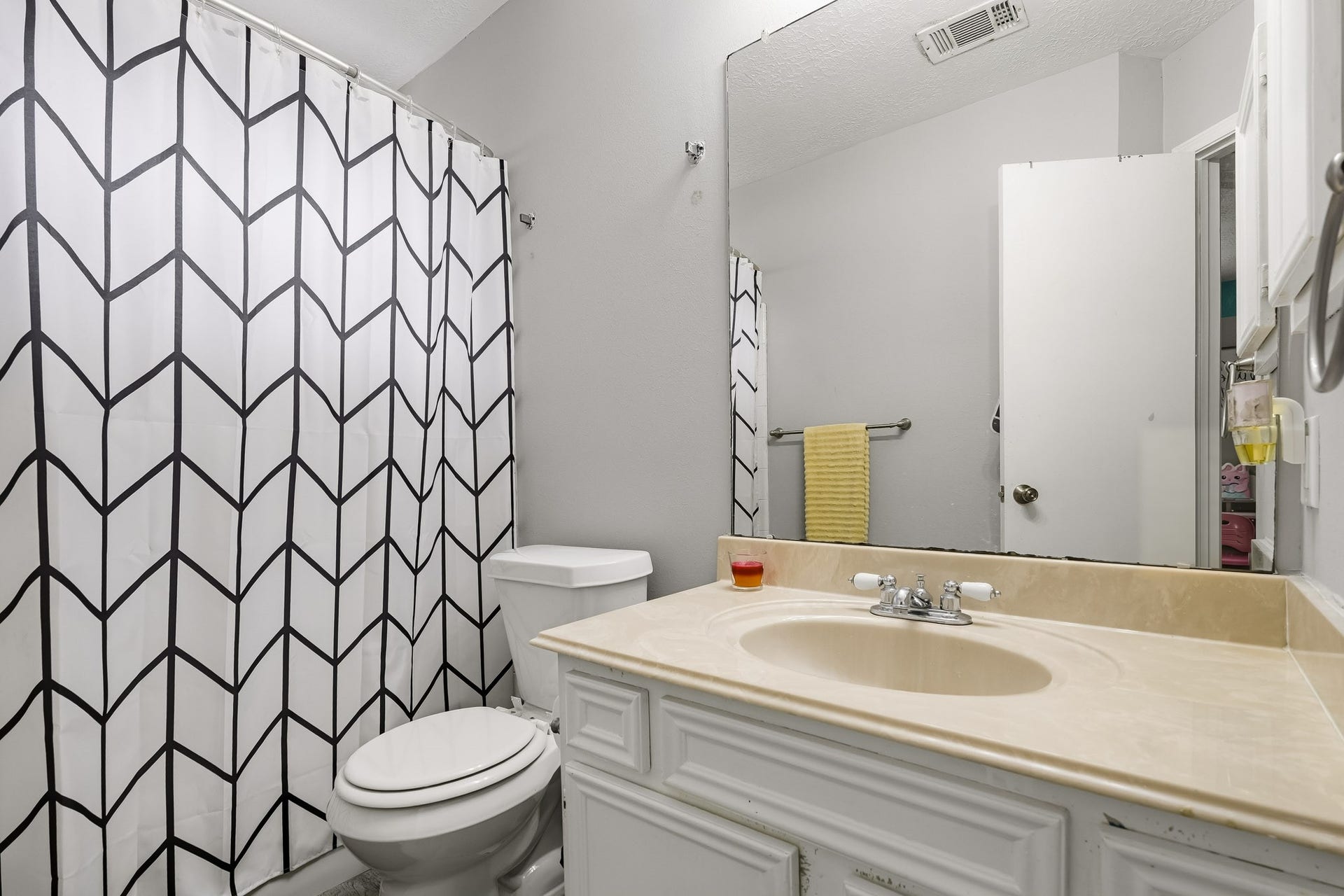 4811 Red Lantern Drive, Friendswood, TX 77546 Charming bathroom featuring a sleek countertop with ample space.