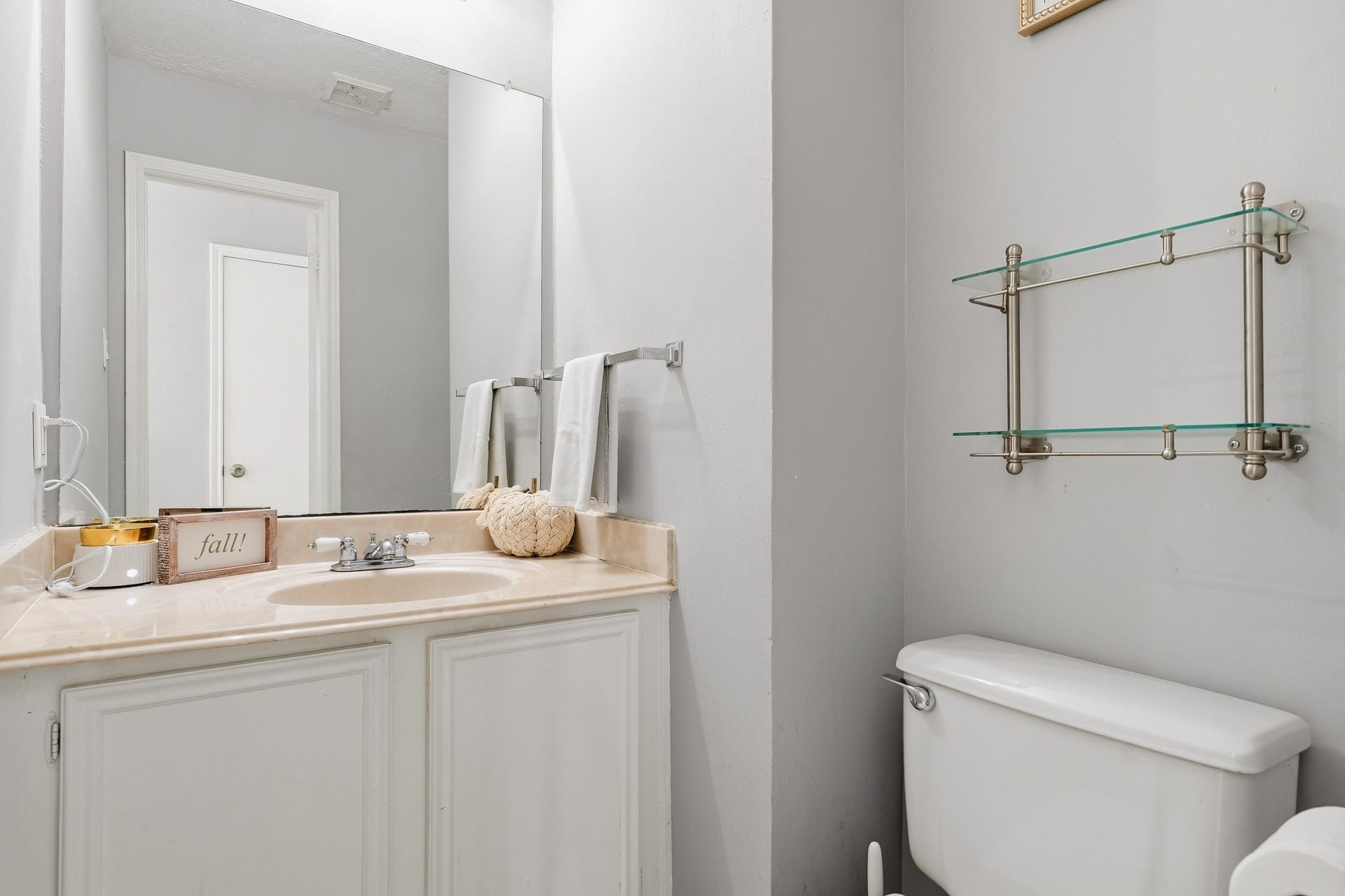 4811 Red Lantern Drive, Friendswood, TX 77546 Charming bathroom with a modern touch, featuring a sleek vanity and ample counter space.