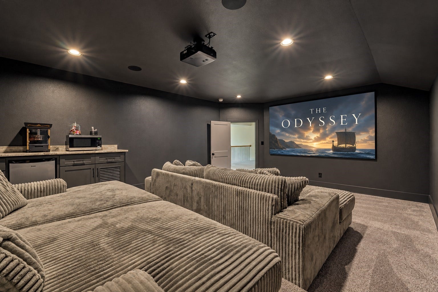 8616 Grand Lake Estates Drive, Montgomery, TX 77316 *This is a virtually staged photo* Complete with tiered seating and a dry bar entertainment area with a beverage fridgethe perfect spot to prepare snacks and refreshments for movie night!