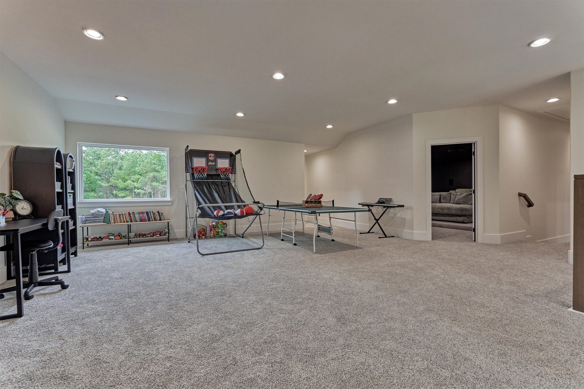 8616 Grand Lake Estates Drive, Montgomery, TX 77316 Incredibly expansive game room offers all the room you could need and more! Youll love the plush carpeting, recessed lighting, and generous proportions for endless possibilities.