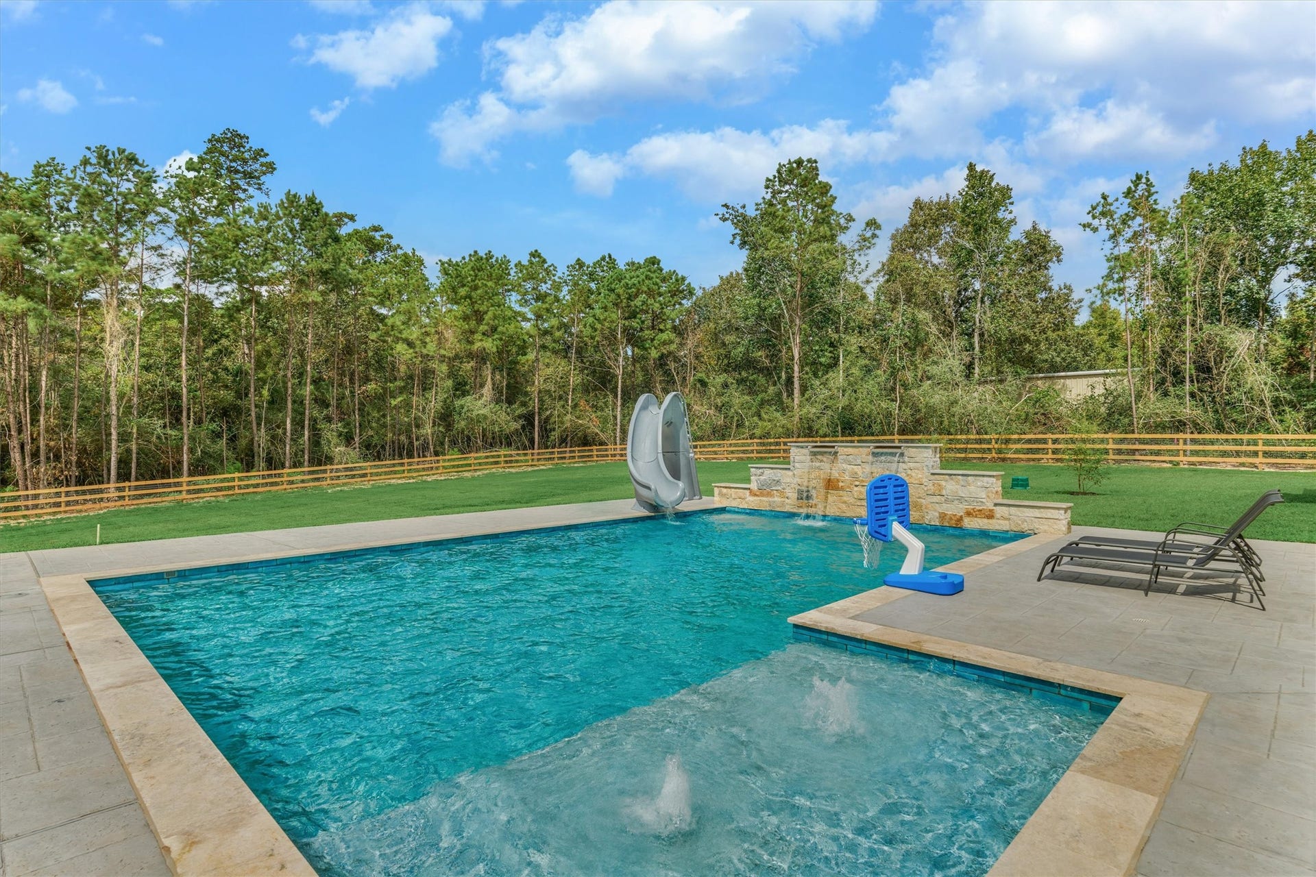 8616 Grand Lake Estates Drive, Montgomery, TX 77316 Texas summers have never looked better with this sparkling pool, exceptional privacy, and tranquil backyard views!