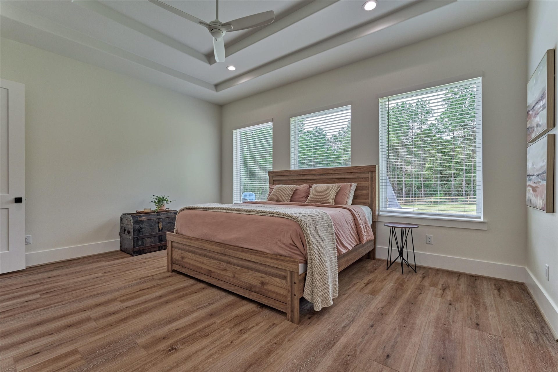 8616 Grand Lake Estates Drive, Montgomery, TX 77316 This owners sanctuary is ready for your personal touch and showcases serene views of the private backyard.