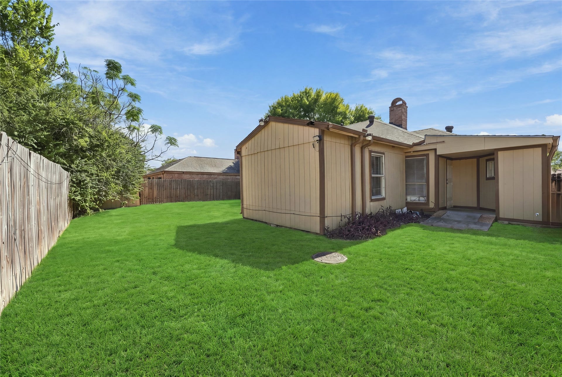 Spacious backyard  perfect for kids to play and adults to unwind.