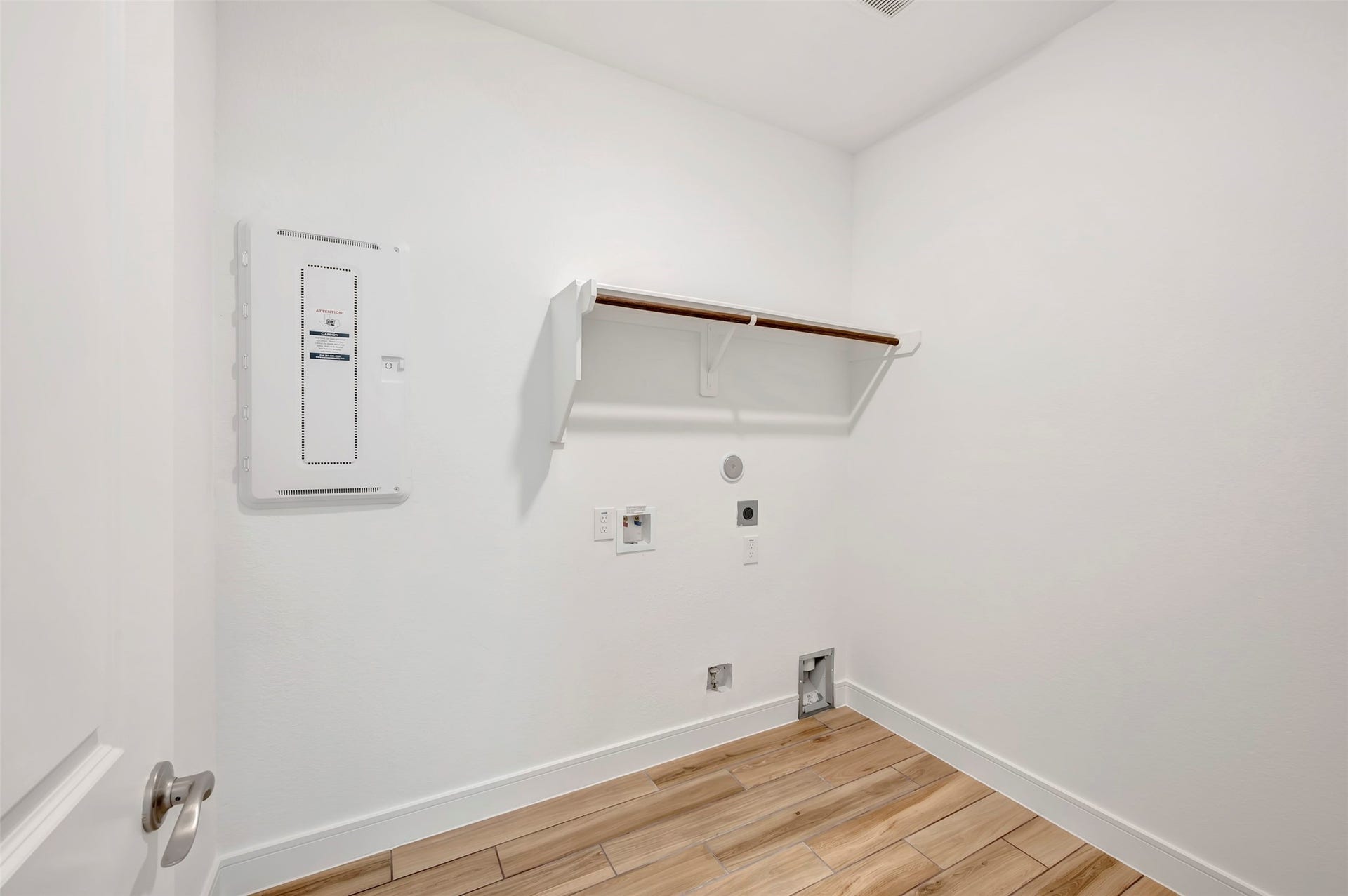 Laundry room (*Photo not of actual home and used for illustration purposes only.)