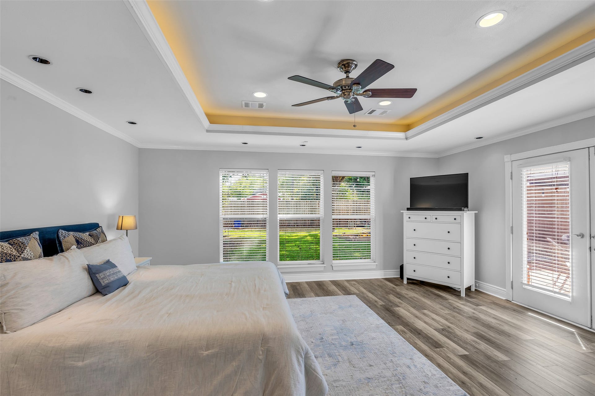 5511 Hialeah Drive, Houston, TX 77092 Plenty of natural light in the primary with french doors leading out to the patio.