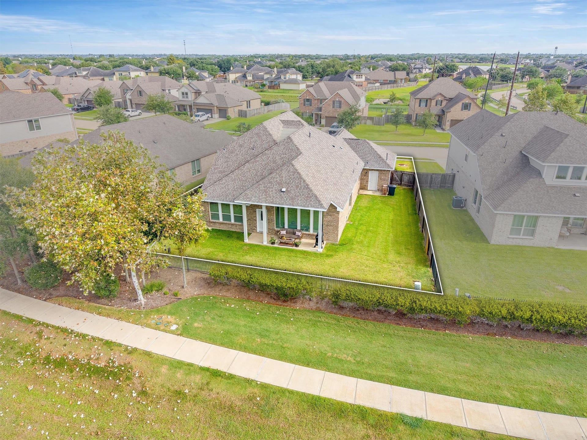 9034 Japonica Drive, Rosenberg, TX 77469 Lake View + NO MUD TAX = The ultimate home run. Relax, unwind, and enjoy the scenery right behind your fence!