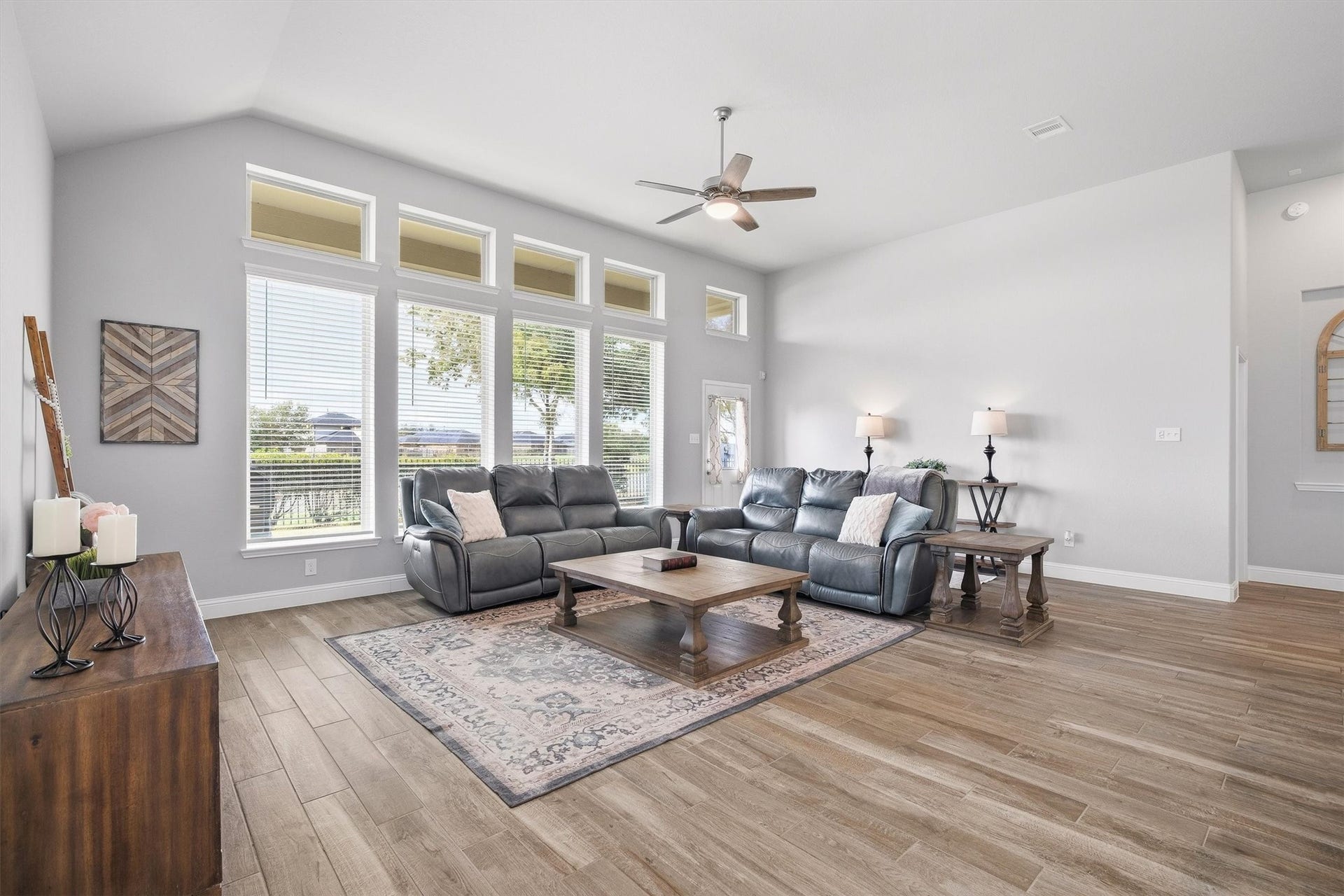 9034 Japonica Drive, Rosenberg, TX 77469 Where modern design meets cozy living. Peep that gorgeous natural light pouring in!
