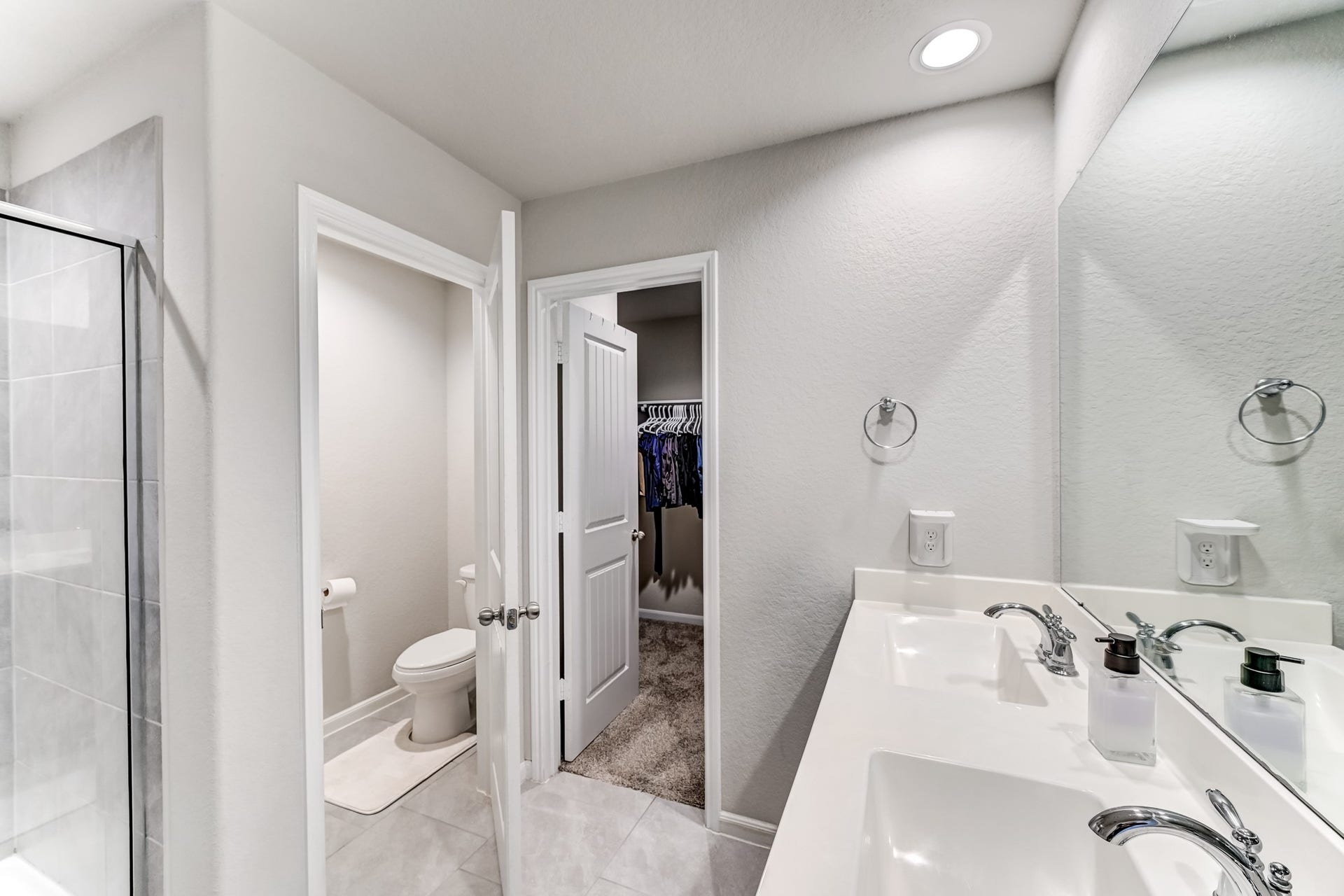 Primary bathroom with separate water closet