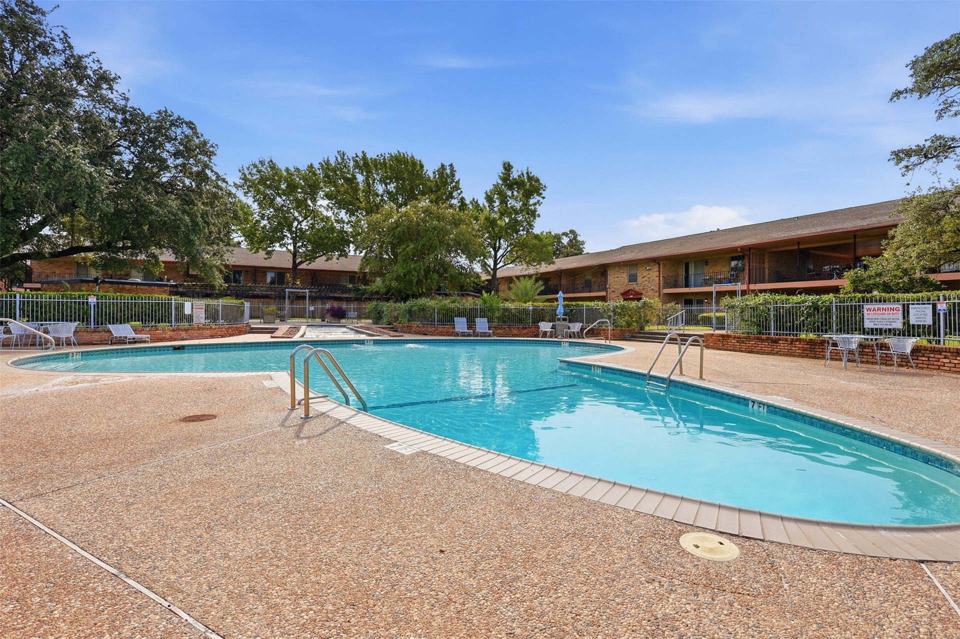 7600 Burgoyne Road, #250, Houston, TX 77063 Dive into relaxation with this inviting pool, perfect for sunny days and serene evenings in your new home oasis.