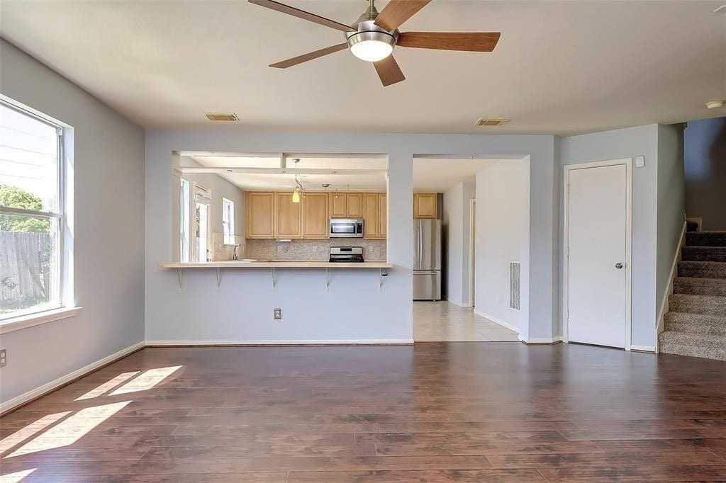 6707 Wild Pecan Trail, Houston, TX 77084 View of the kitchen from the bonus space, can be used as a formal living or second living space.