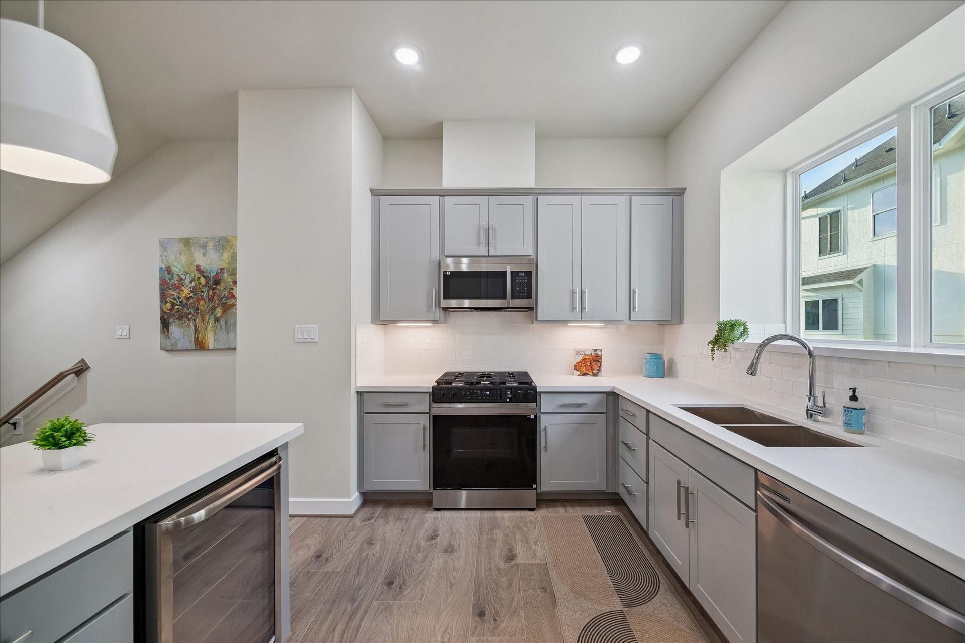 Representative photo showing the communitys model home kitchen. Layout and selections may vary.