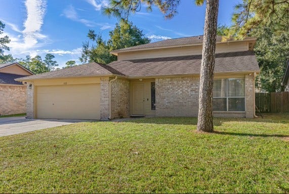 3727 Village Grove Drive, Humble, TX 77396 A beautifully manicured front lawn, freshly mowed and meticulously maintained, creating exceptional curb appeal and a welcoming first impression. Long driveway with additional parking.