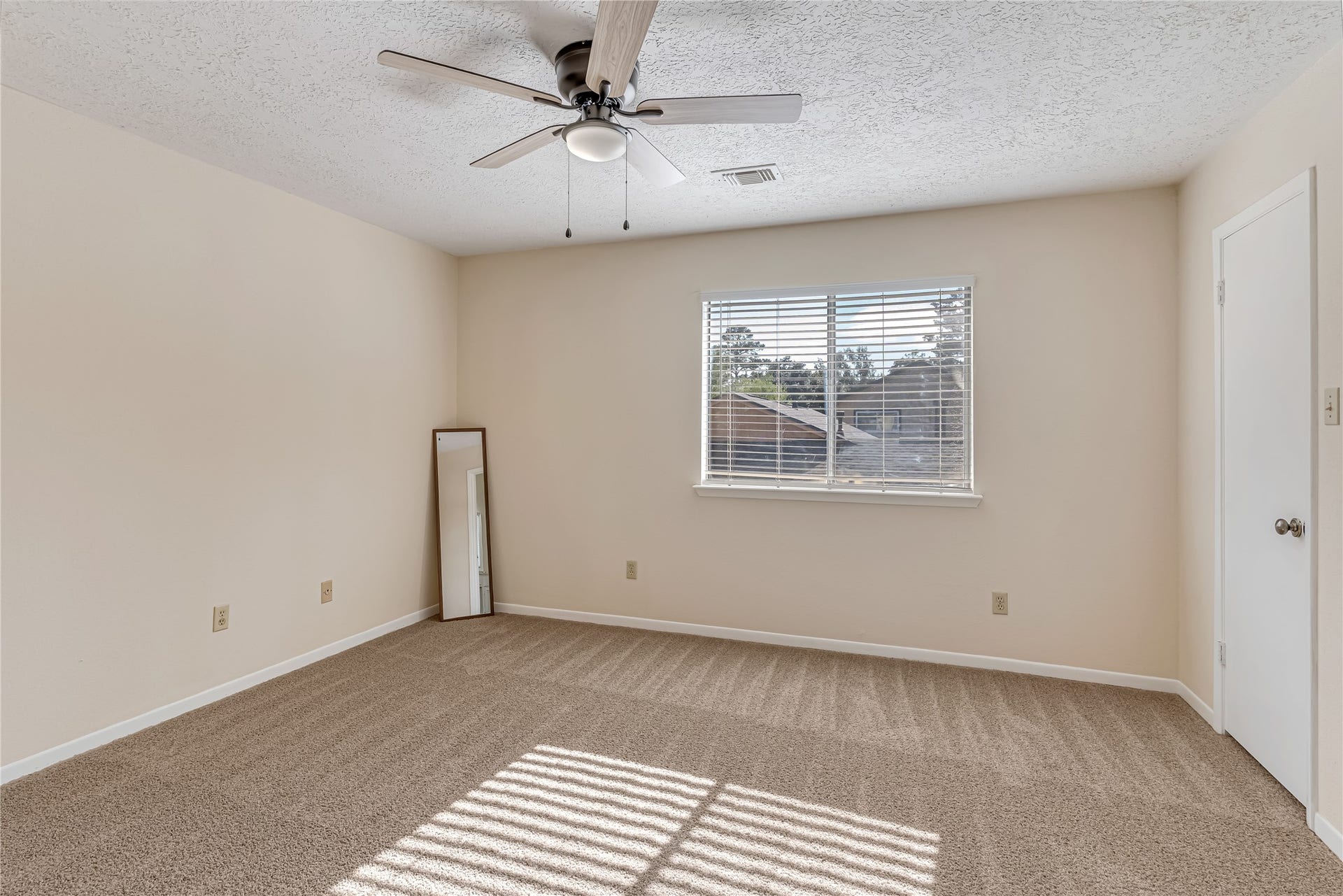 3727 Village Grove Drive, Humble, TX 77396 Retreat to the inviting primary bedroom, on the second floor, freshly updated with a crisp coat of paint, new carpet, and a stylish new ceiling fan with light fixture. These thoughtful updates create a fresh, comfortable atmosphere, offering the perfect place to unwind, relax, and recharge at the end of the day.