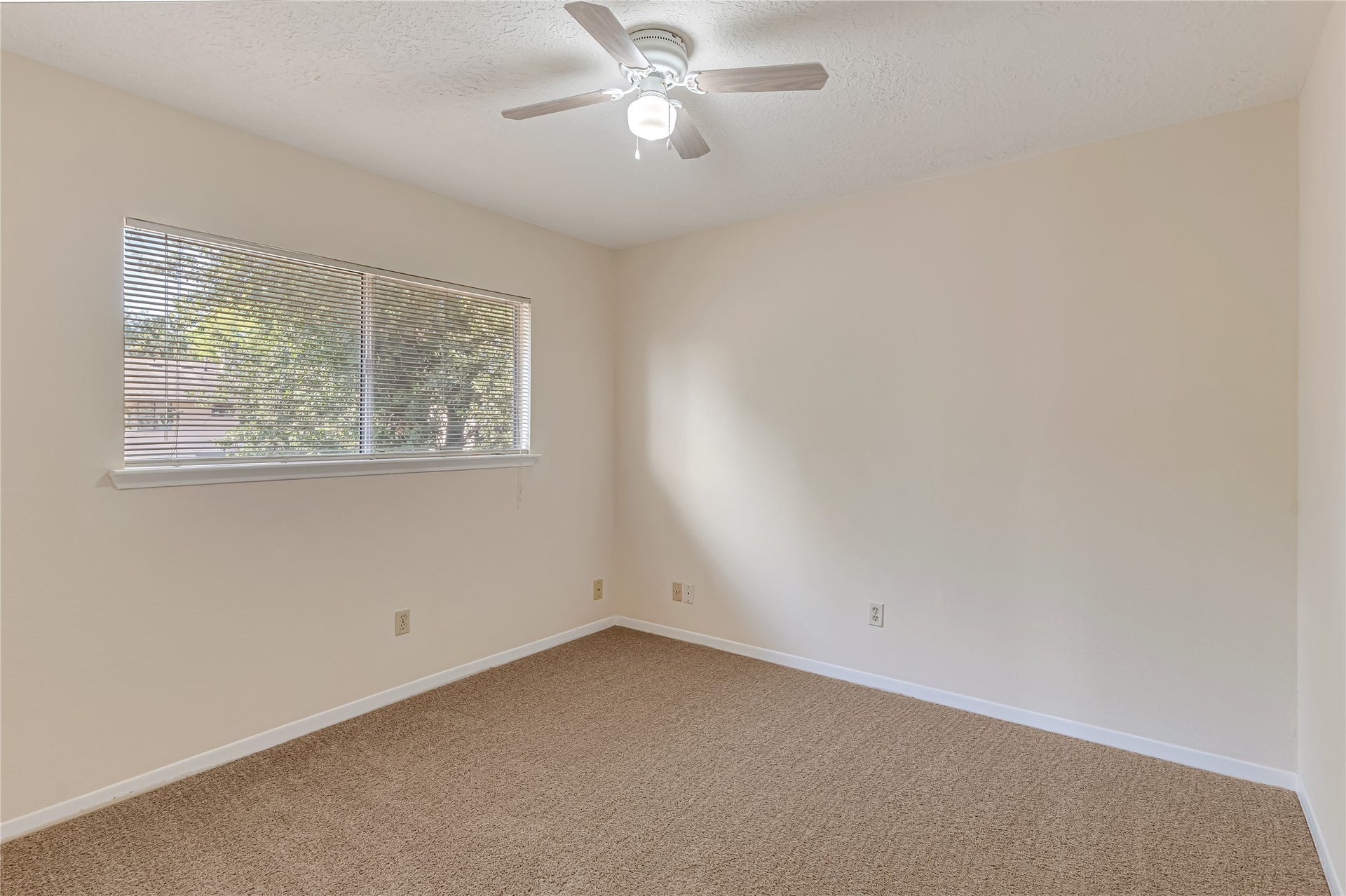 3727 Village Grove Drive, Humble, TX 77396 All guest bedrooms offer generous space and walk-in closets, providing comfort, functionality, and plenty of storage. Fresh paint, new carpet, and updated light fixtures give each room a clean, refreshed feel. These inviting spaces are ready to accommodate your lifestyle, whether you need restful retreats, guest accommodations, or a home office.