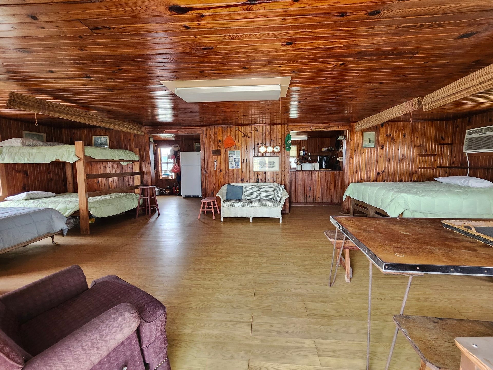 The main room is off the deck and the kitchen