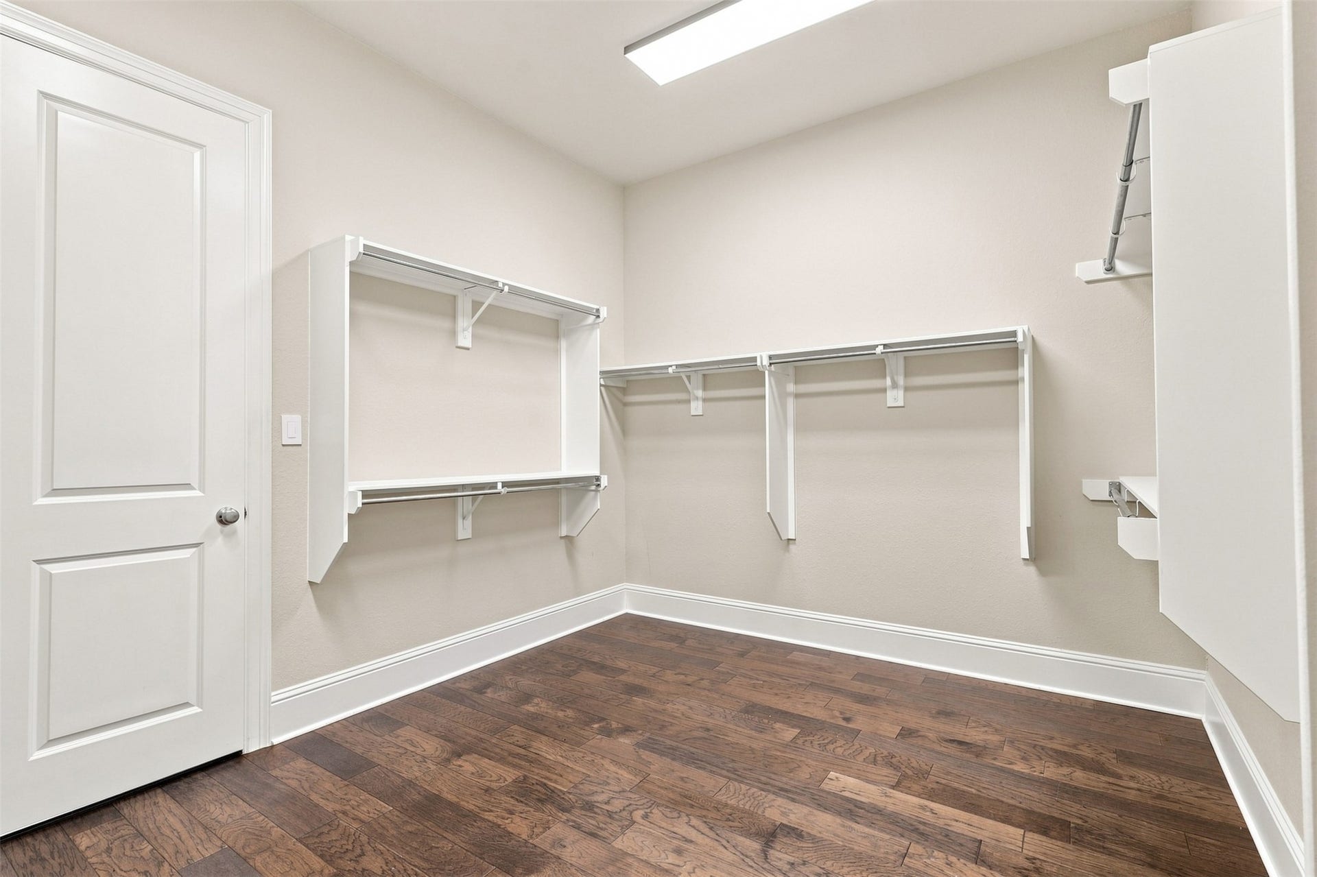35 Gracenote Place, The Woodlands, TX 77375 Generous primary closet offers abundant space for clothing, shoes, and everyday organization.