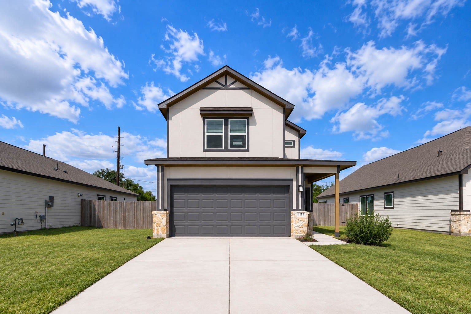 1115 Santee Court, Rosharon, TX 77583 Straight on, the gabled roofline and dark garage door give this home a clean, contemporary look that stands out on the block. The long driveway makes parking easy, and the covered porch at the right of the garage keeps the entry sheltered. With a manicured lawn and neutral palette, the exterior is simple to maintain and ready to welcome its first owner.