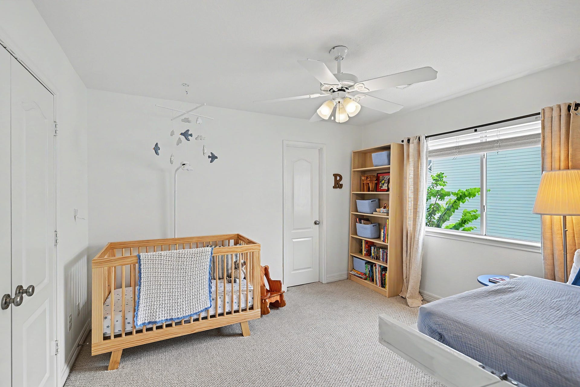 Secondary bedroom with ensuite bath and large window
