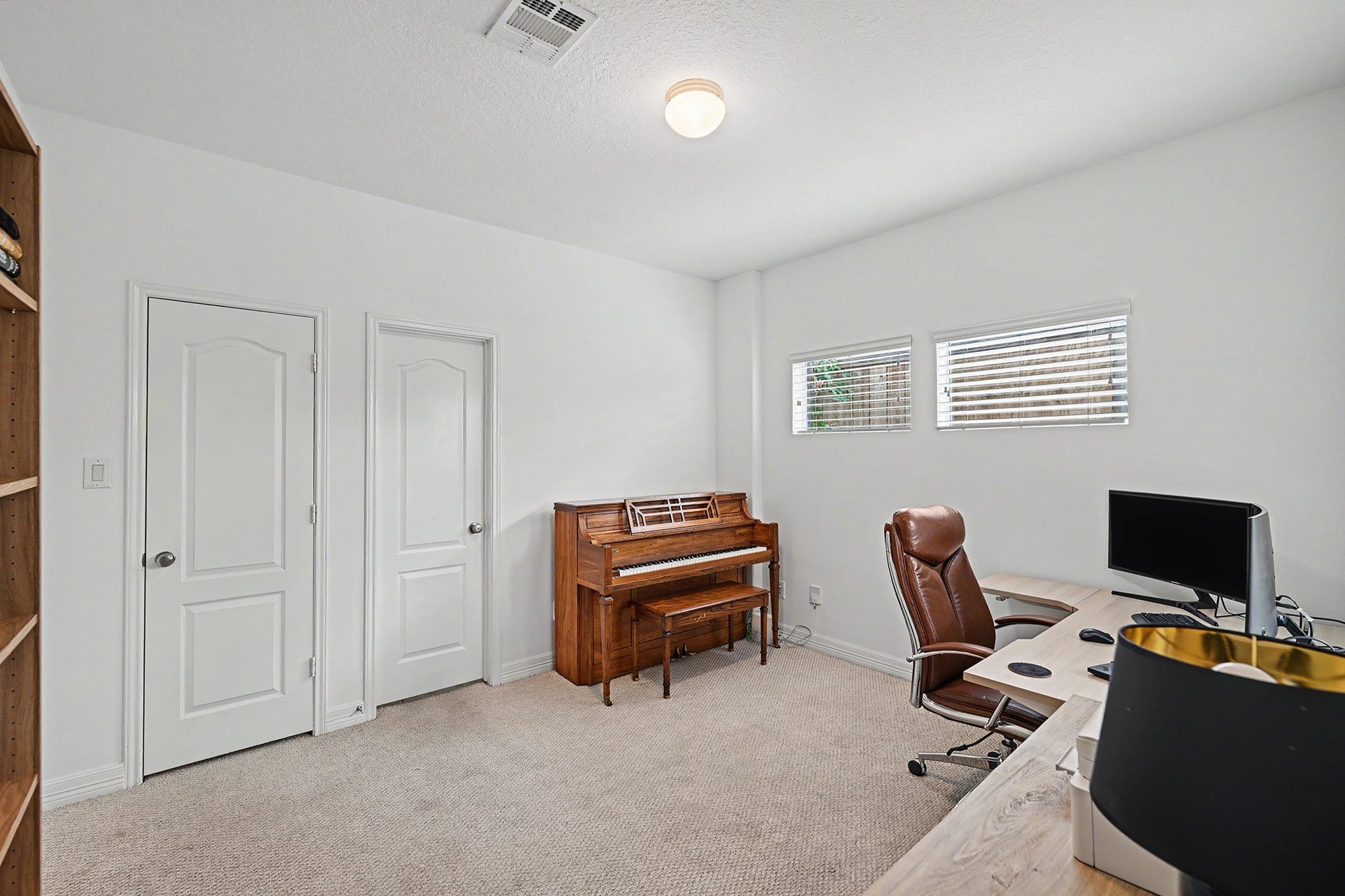 Bright and sunny frst-floor secondary bedroom with ensuite bath and walk-in closet