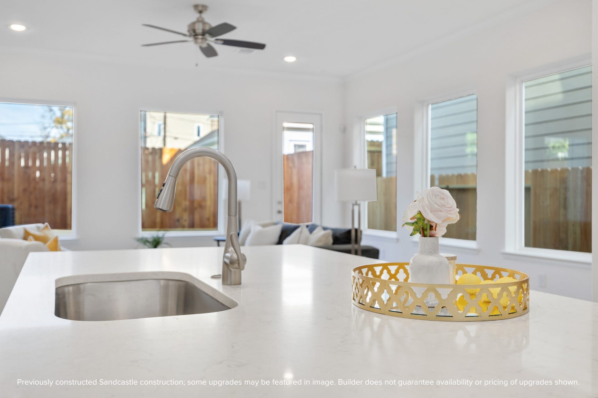 Designer Finishes Meet
Everyday Function: Timeless meets trendy in this gourmet kitchen with Benedettini cabinets with soft-close drawers, quartz countertops, and custom design selections.
The open layout keeps you connected to the living and dining spaces beyond.