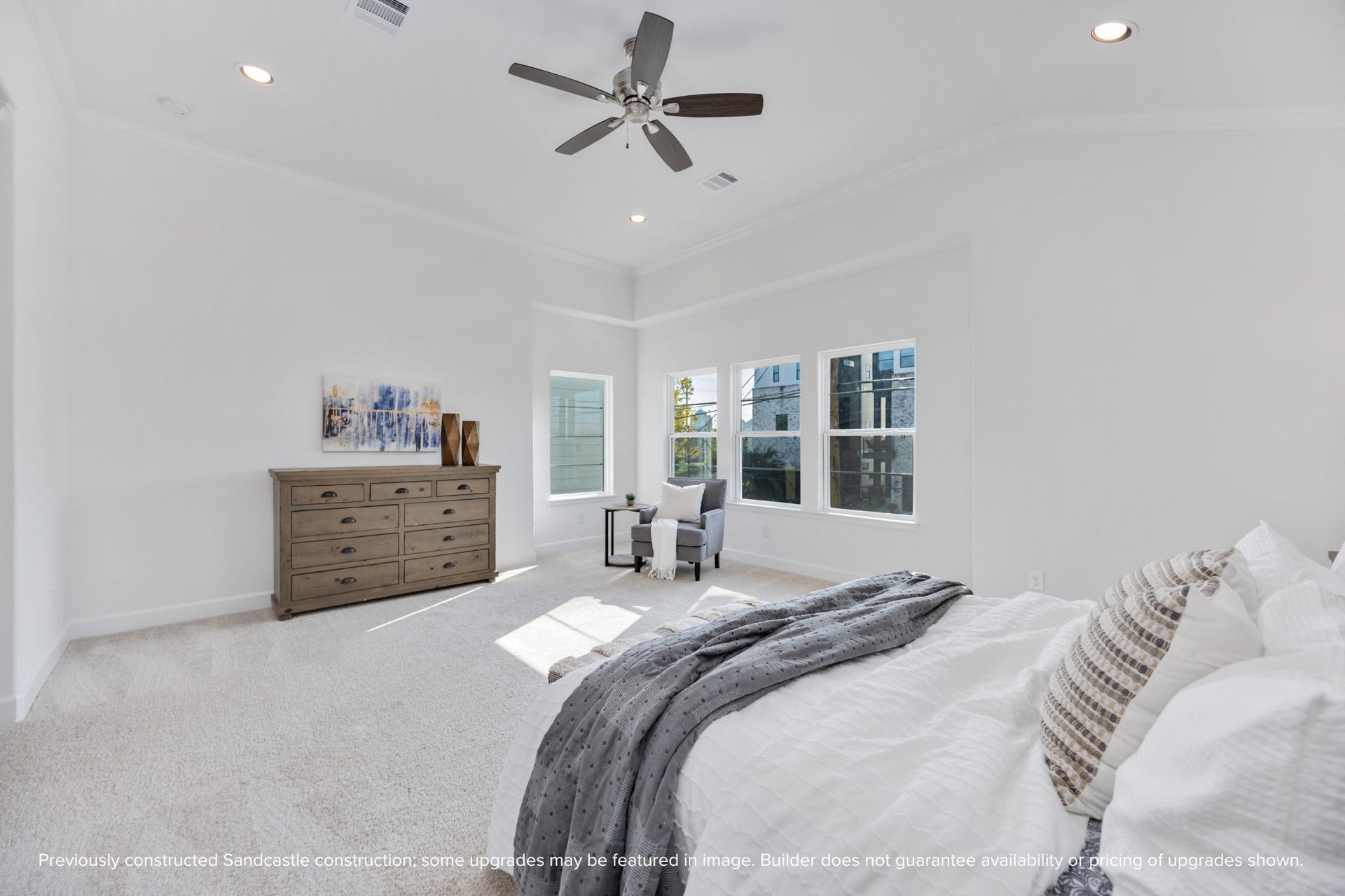 Bask in all-day sunshine thanks to walls of windows in this luminous bedroom. Whether youre curling up with a book or sipping your first coffeethis space just feels good.