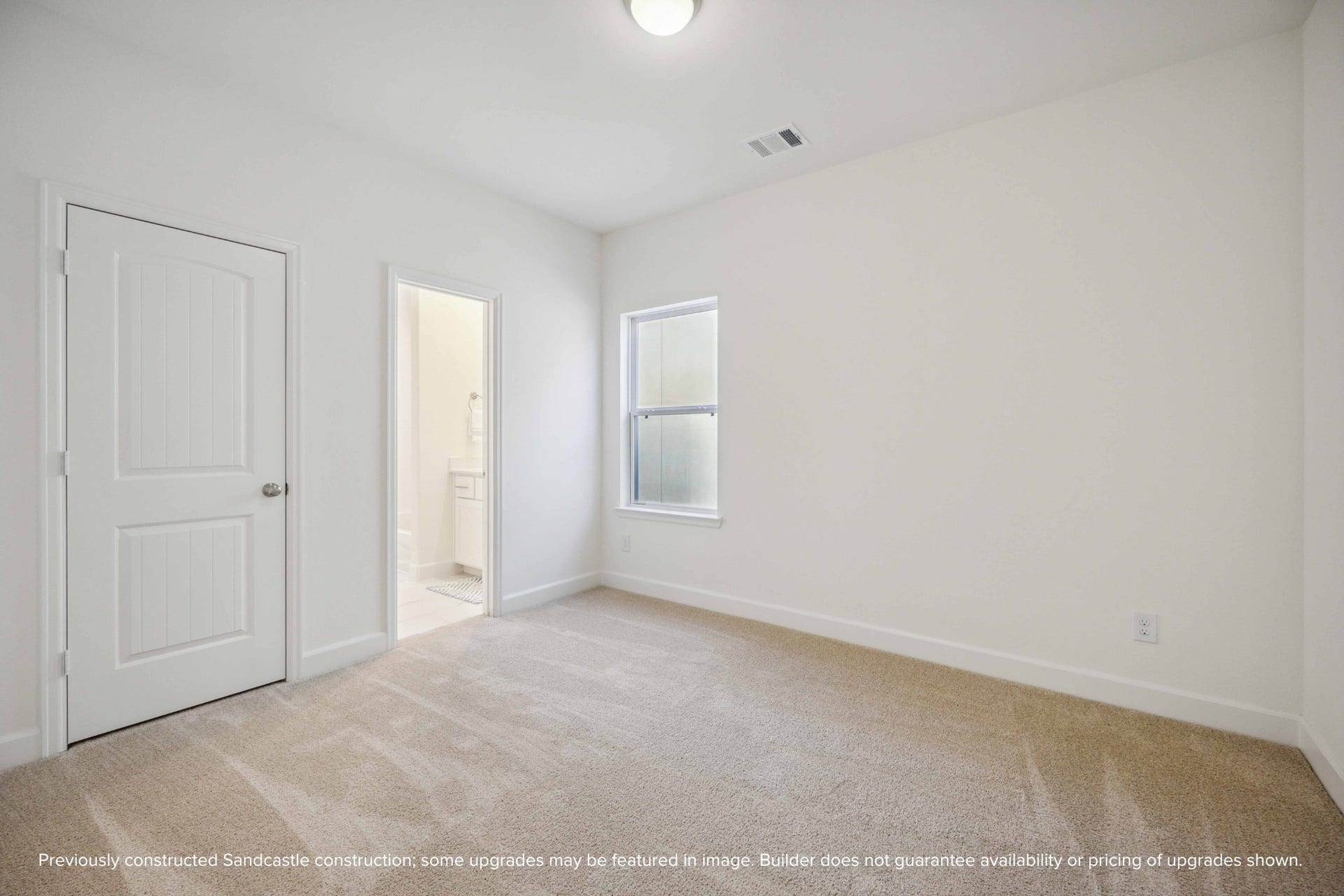 A secondary bedroom with ensuite vibes. Ideal for guests, roommates, or your favorite teenager who wants a little space of their own.