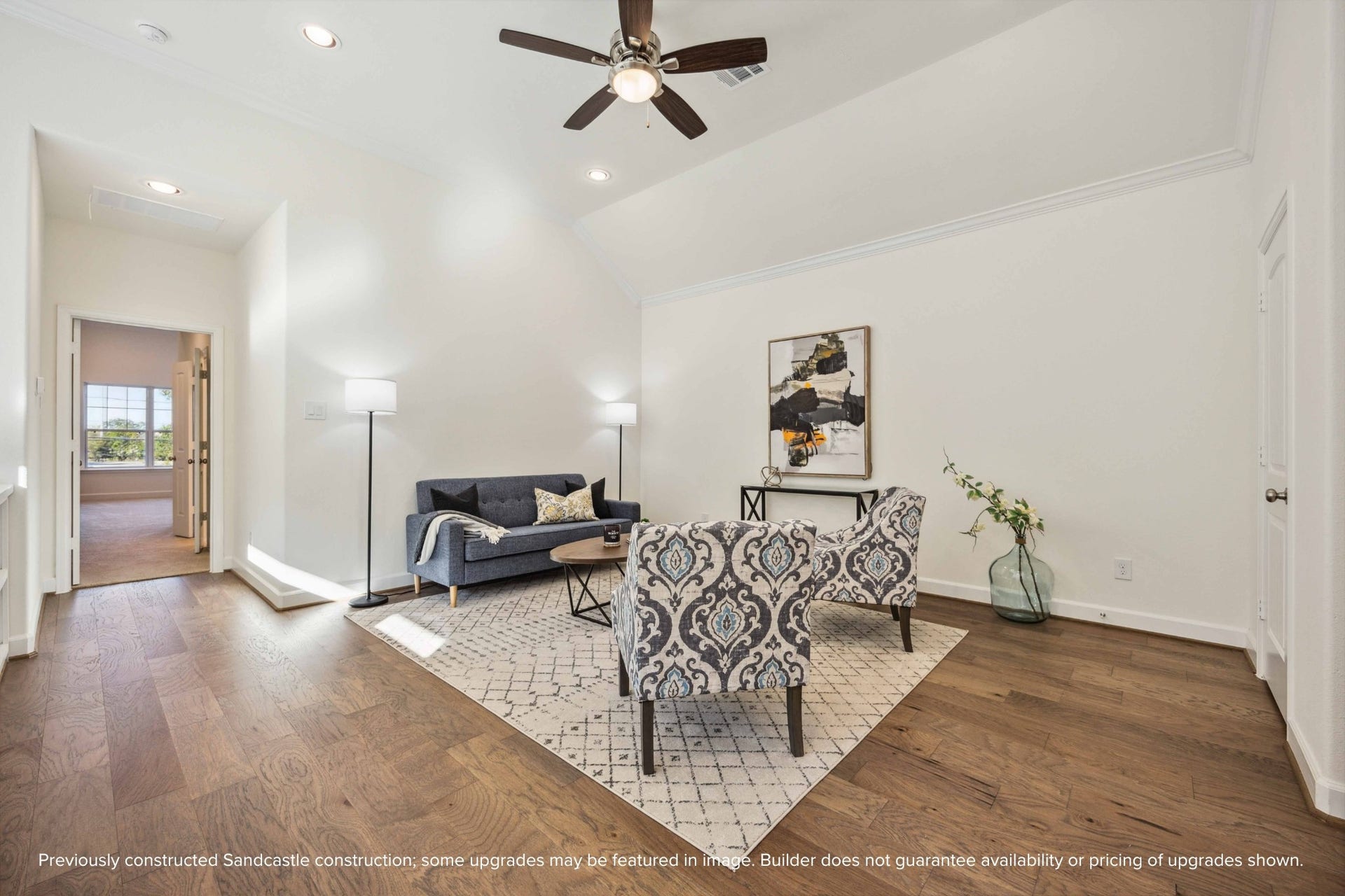 Perched at the top of the stairs, this upstairs lounge is a choose-your-own-adventure spacecozy TV den, home office, or creative corner. The vibe? Totally relaxed.