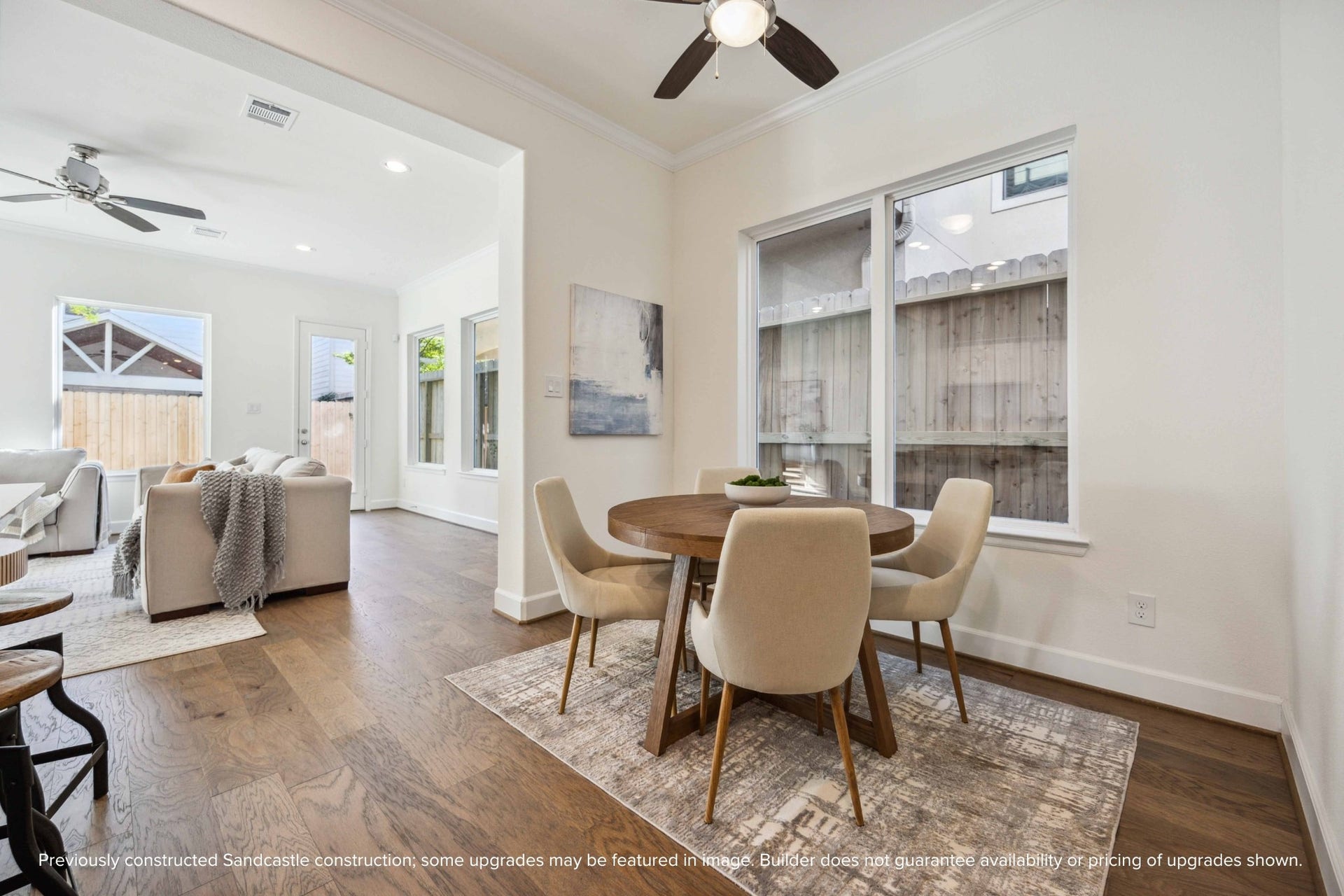 Your dining area is perfectly tucked awayintimate enough for dinner for two, open enough to feel part of the flow. Large windows let the sunshine pour in.