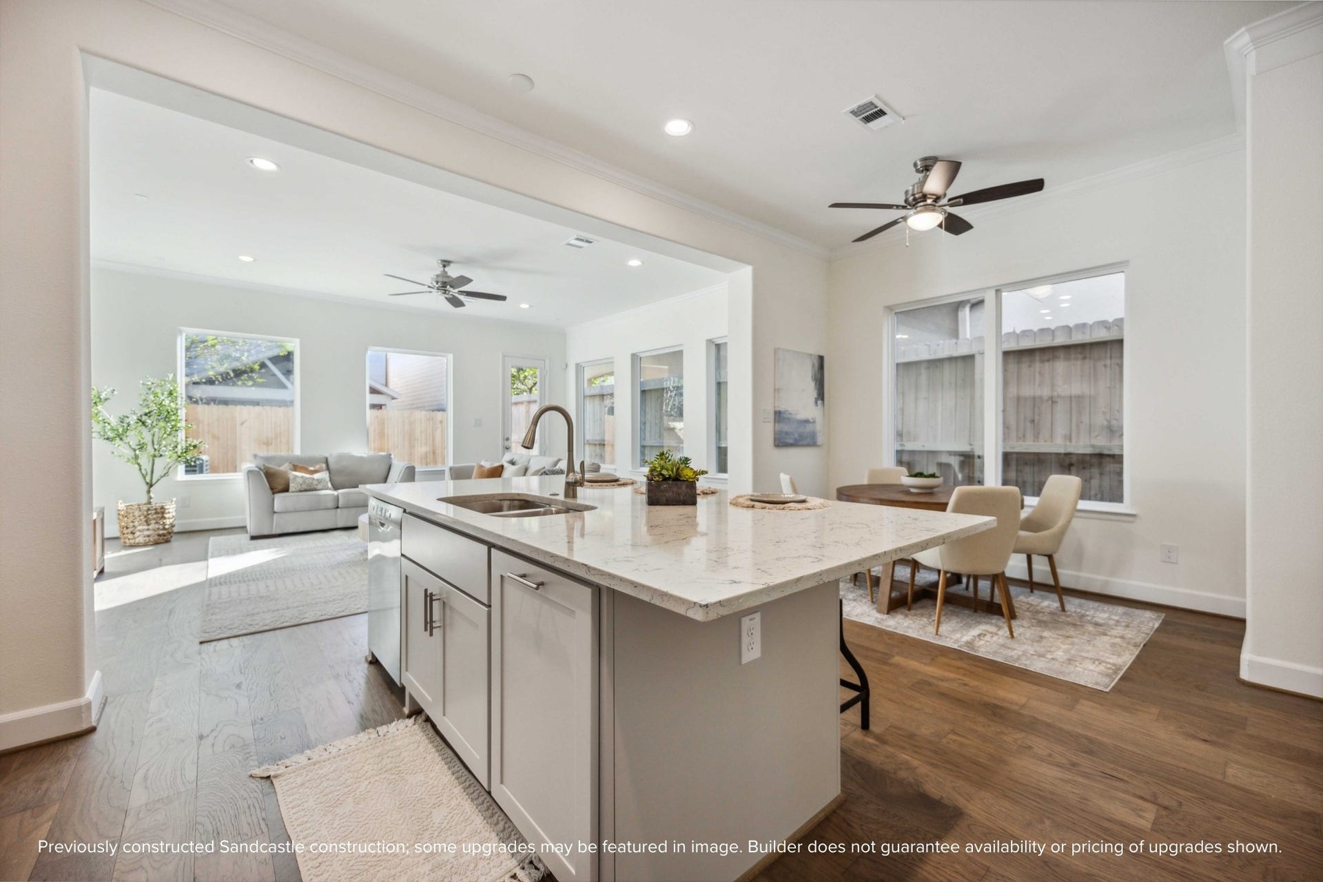 Whether youre prepping dinner or pouring wine for friends, this oversized island is the hub of the homeanchoring the kitchen, dining, and living areas with ease and elegance.