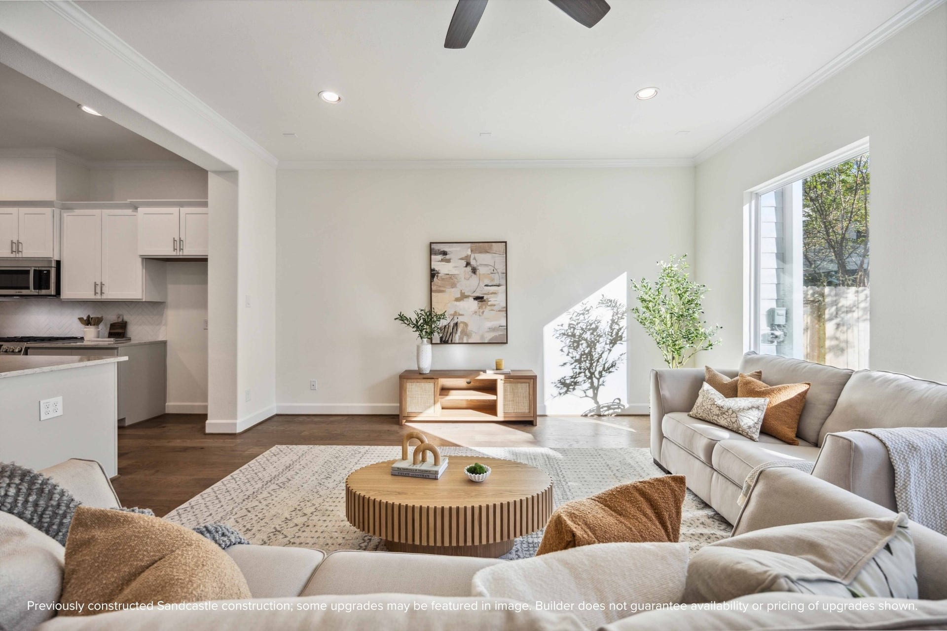 A closer look at the living room highlights the thoughtful designplenty of room for a media setup or statement artwork, plus natural light that changes with the day.
