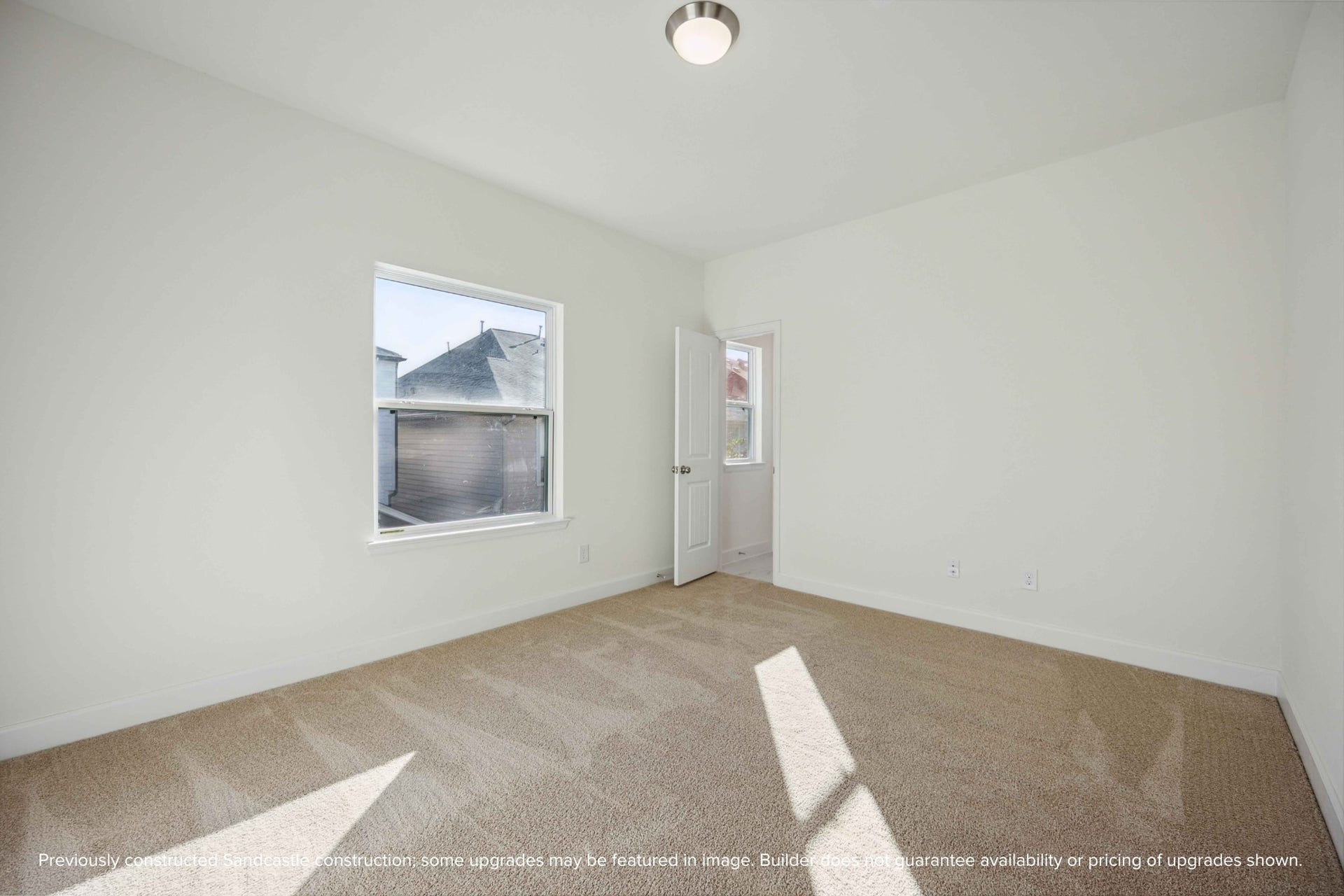 Bright, airy, and ready to become a cozy retreat, this bedroom offers the perfect blank canvas for your personal style.