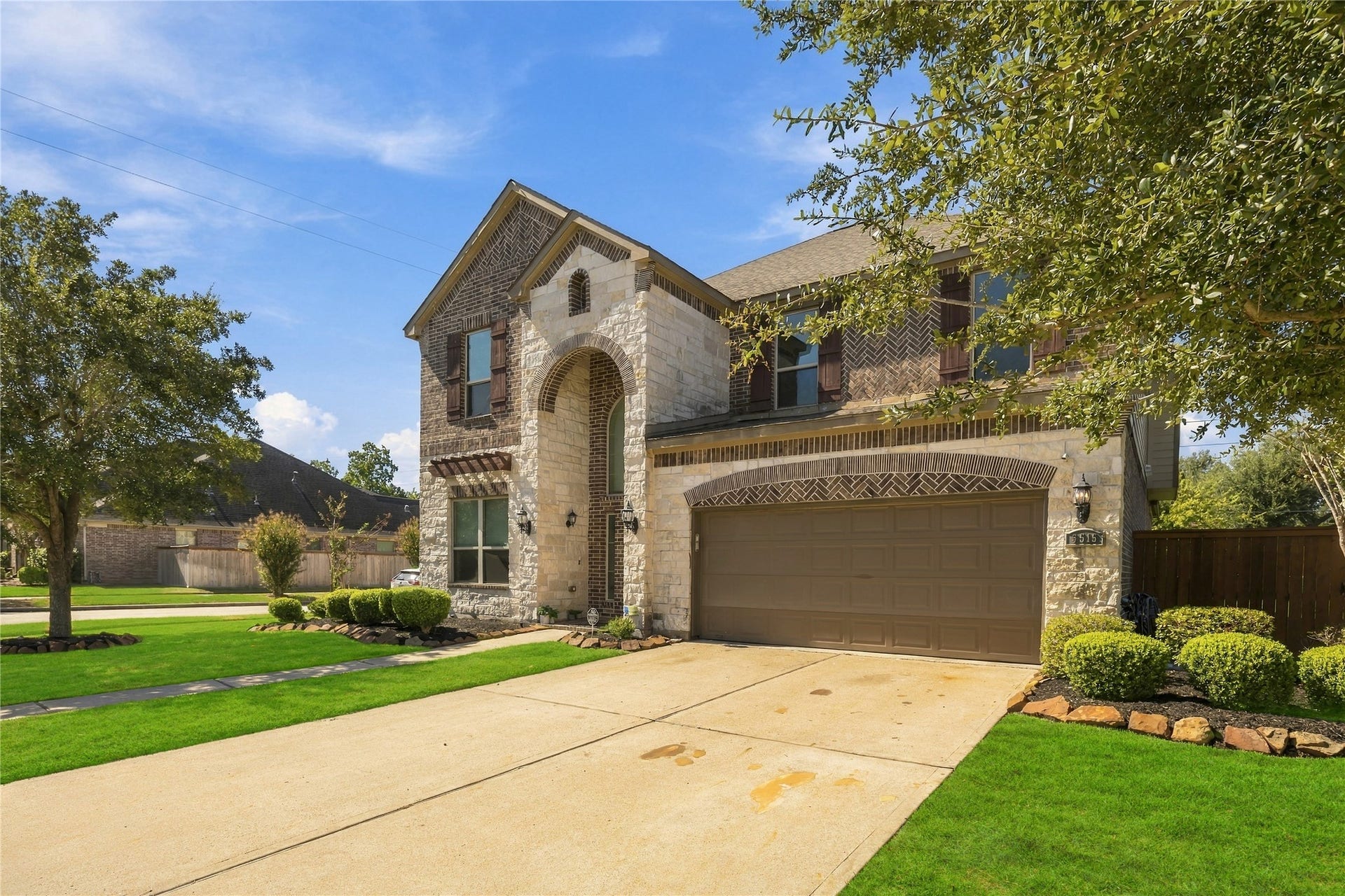 5515 Satterfield Lane, Houston, TX 77084 Beautiful exterior right on a corner lot. (lots of extra parking space for gatherings)