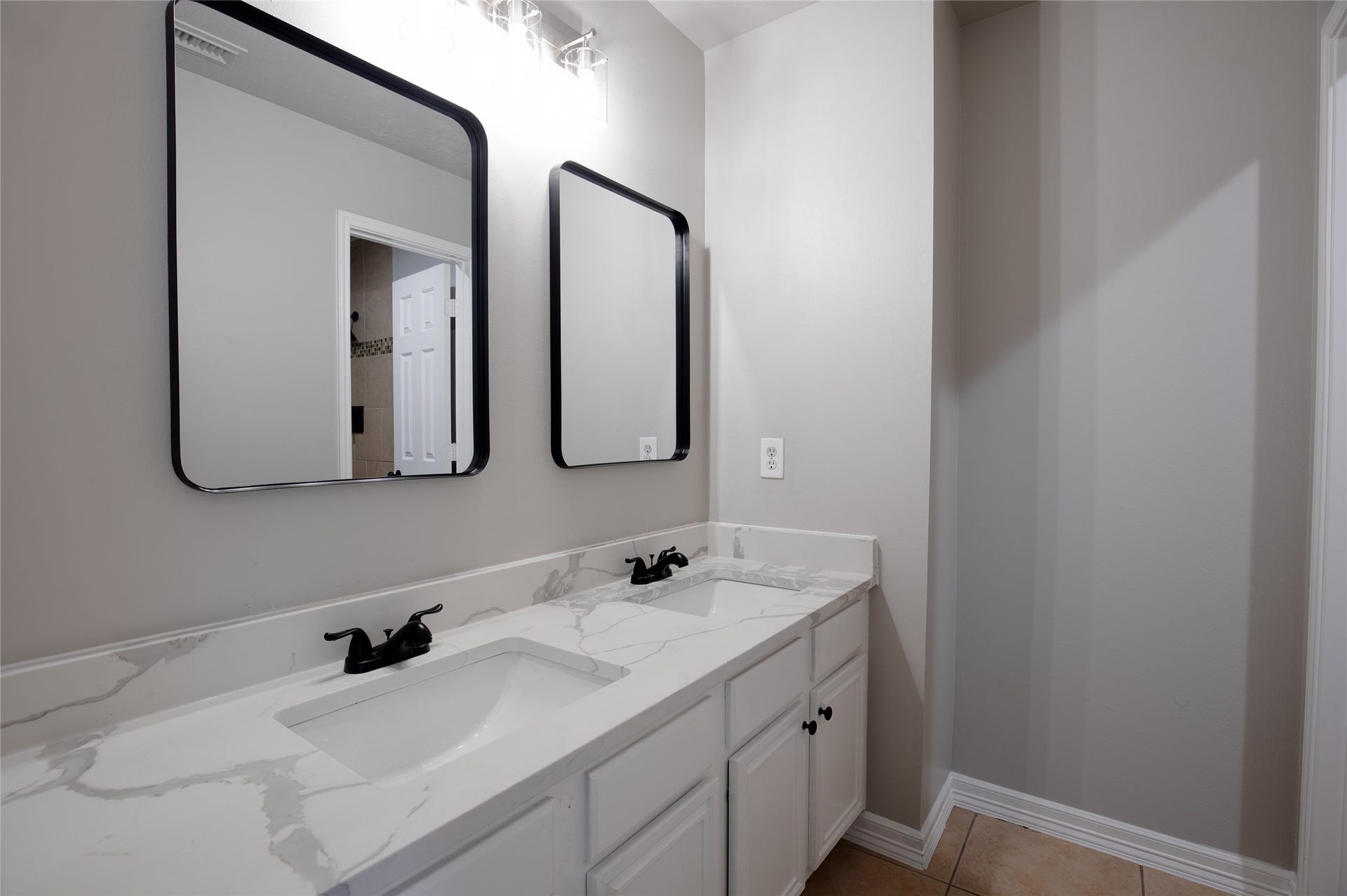 19946 Mason Creek Drive, Katy, TX 77449 Secondary bathroom with double sinks and quartz counters