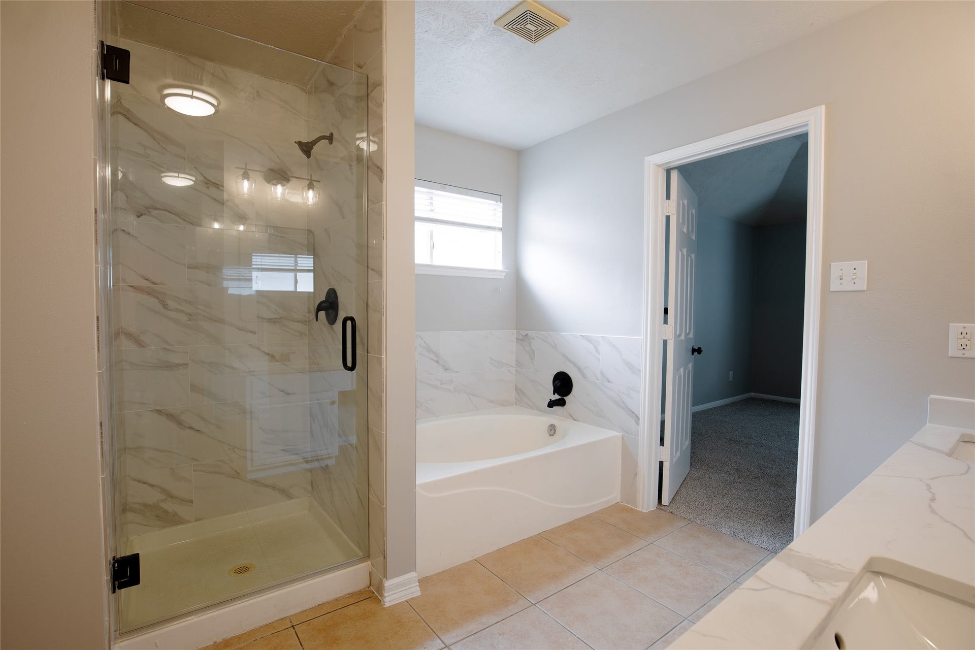 19946 Mason Creek Drive, Katy, TX 77449 Primary bathroom with soaker tub and separate shower