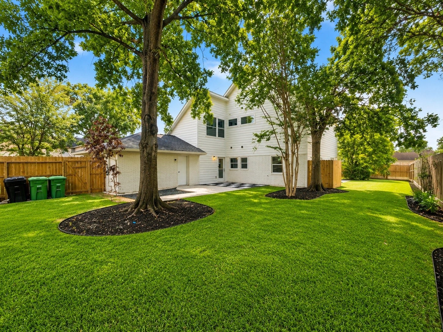 1207 Martin Street, Houston, TX 77018 Enjoy a huge backyard with beautiful mature trees and ample space to create a custom outdoor living experience.
