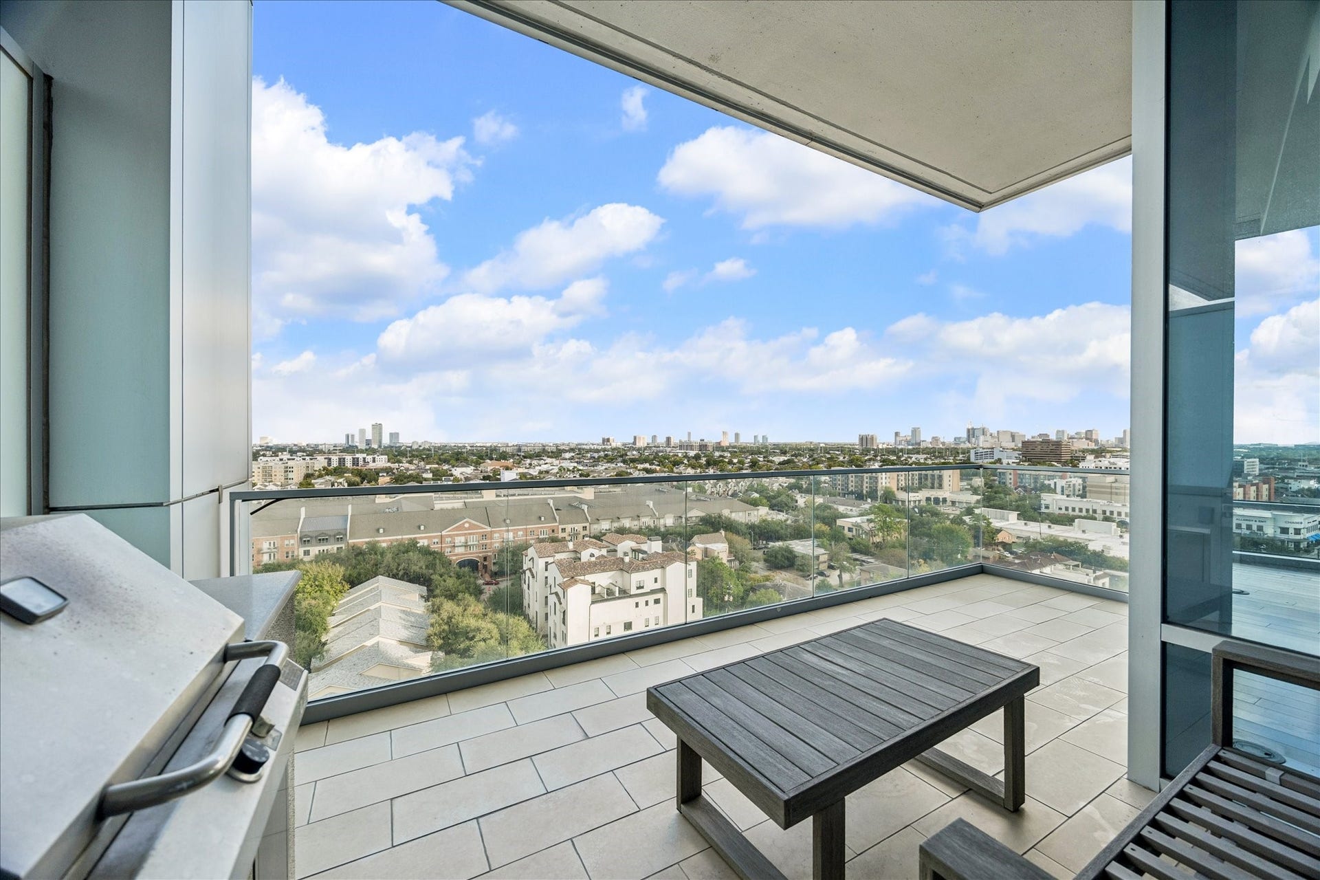 Terrace view showcasing panoramic southeastern skyline and surrounding neighborhoods.