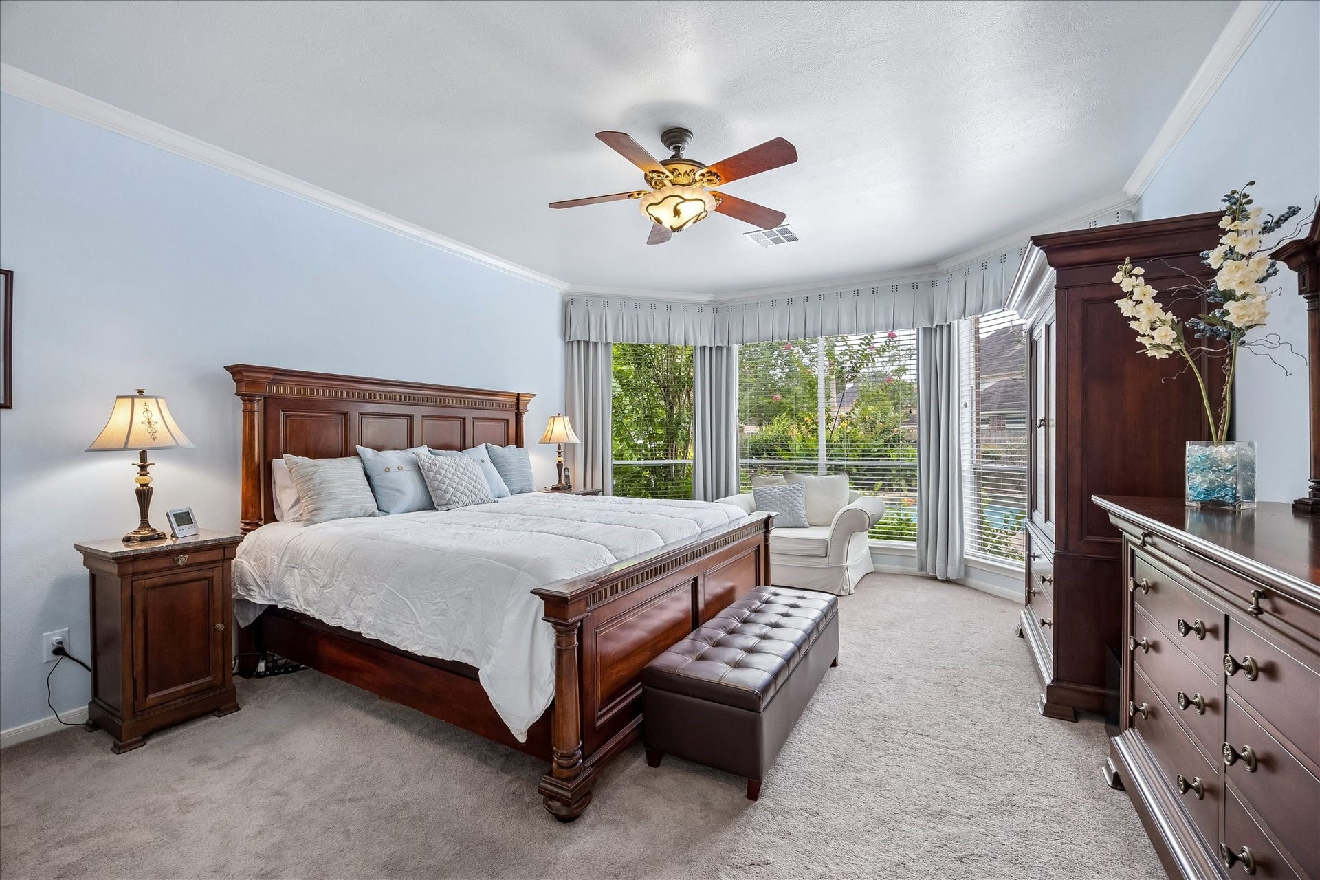 9618 Randon Lane, Missouri City, TX 77459 This huge Primary Bedroom has a nice sitting area with views of the back yard oasis.