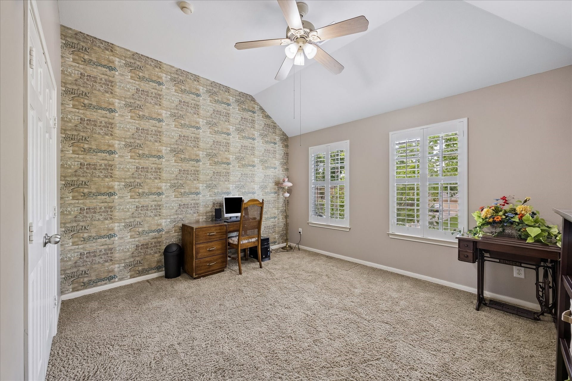 9618 Randon Lane, Missouri City, TX 77459 One of three Secondary Bedrooms. All the upstairs rooms have been upgraded with Plantation Shutters.