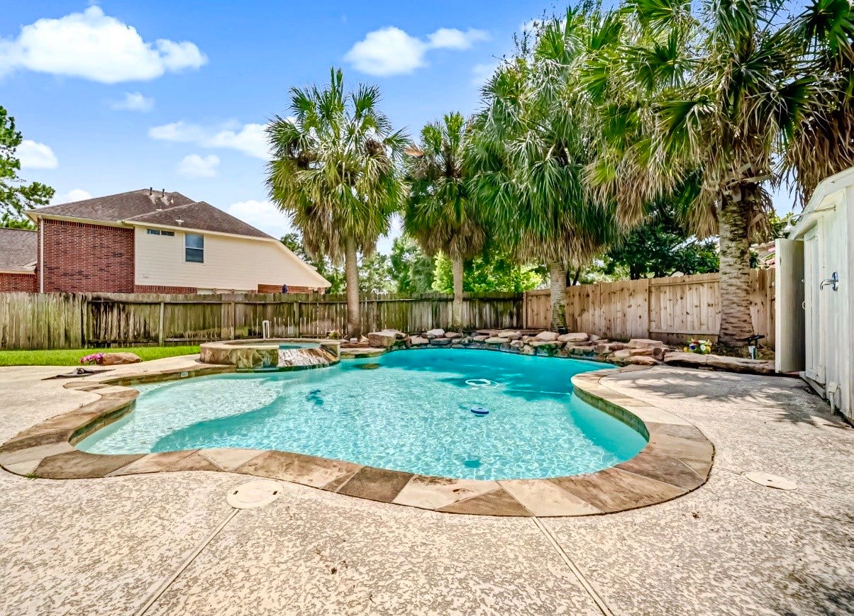 Tons of space around the pool w/enclosed Pool Equipment area