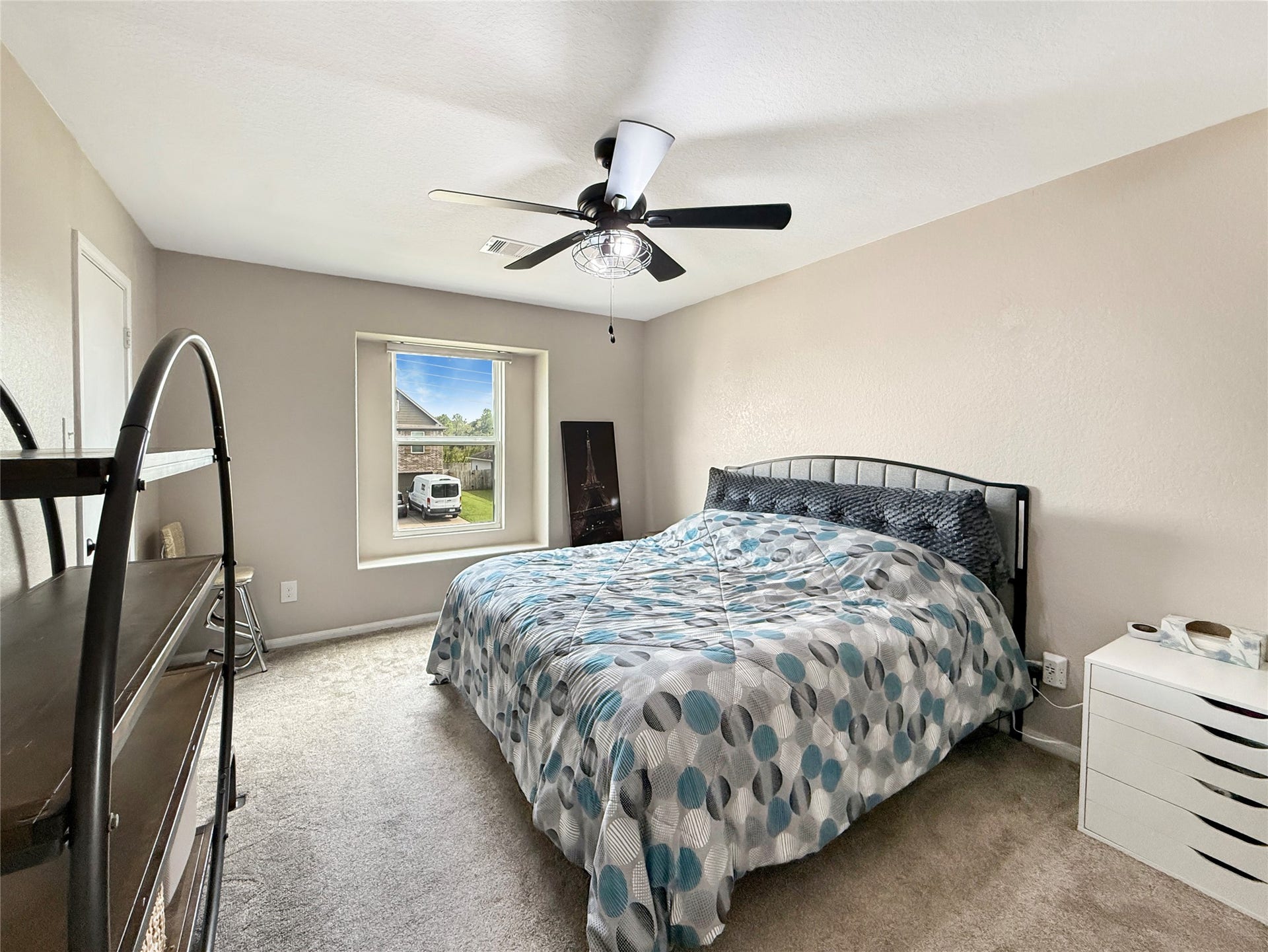 Upstairs secondary bedrooms offer comfortable space to rest, recharge, and make your own.