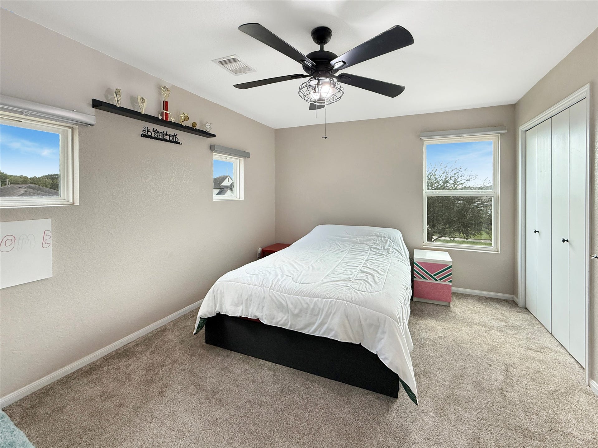 Upstairs secondary bedrooms offer comfortable space to rest, recharge, and make your own.