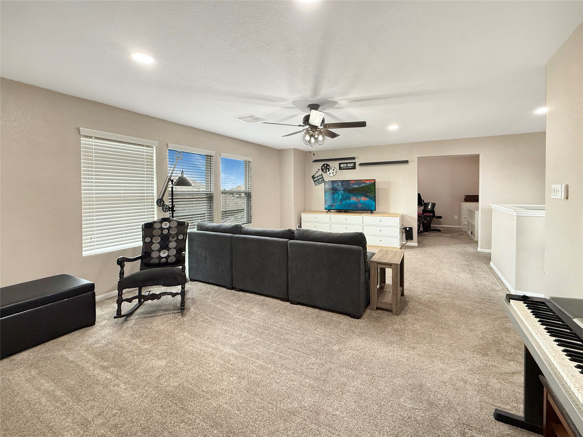 Spacious game room offers flexibility for game nights, a play area, or a comfortable spot to relax.