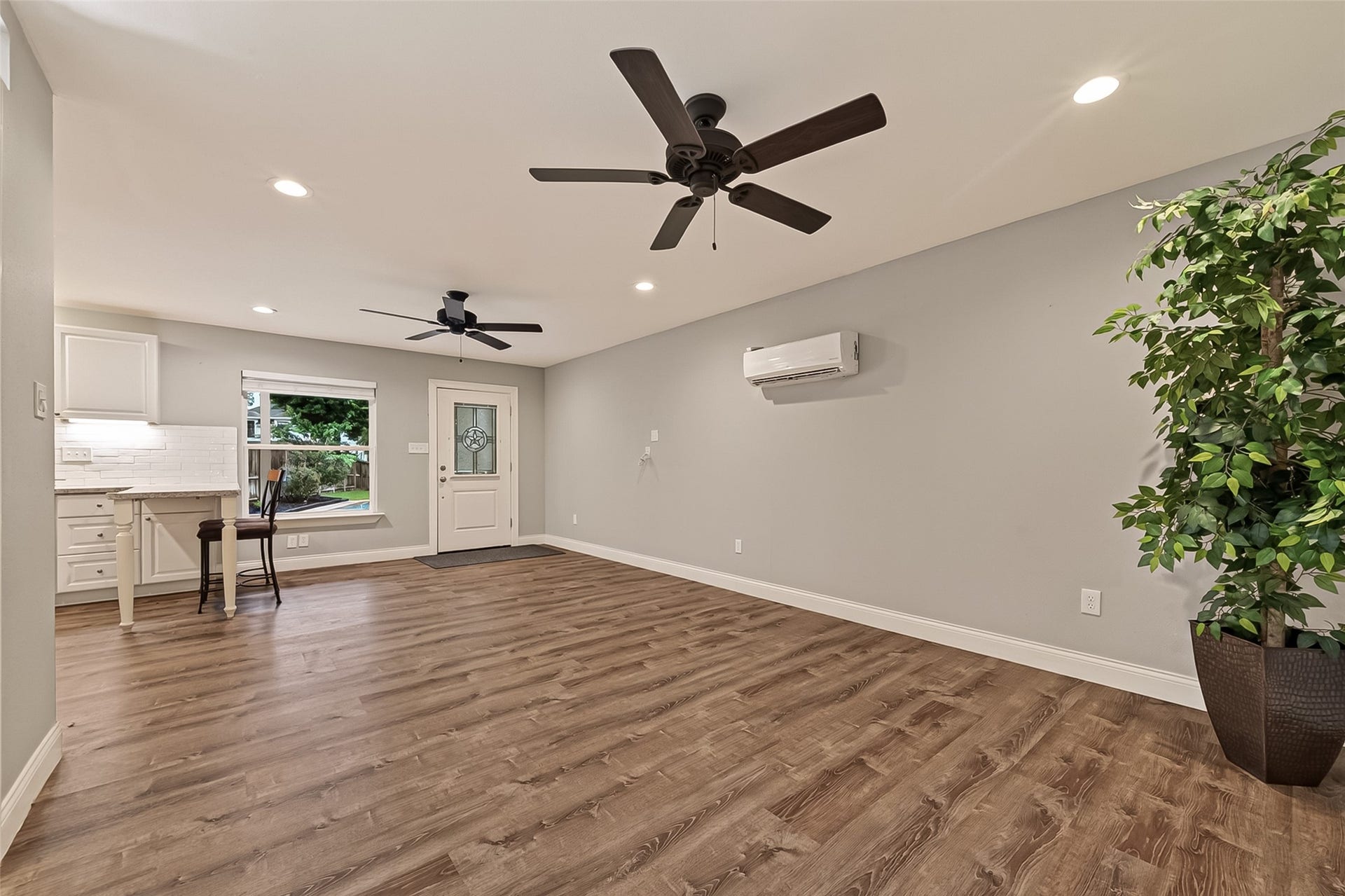 1410 Briar Green Court, Richmond, TX 77406 The Guest Qtrs is updated with LVP Flooring and a minisplit for cooling and heating.