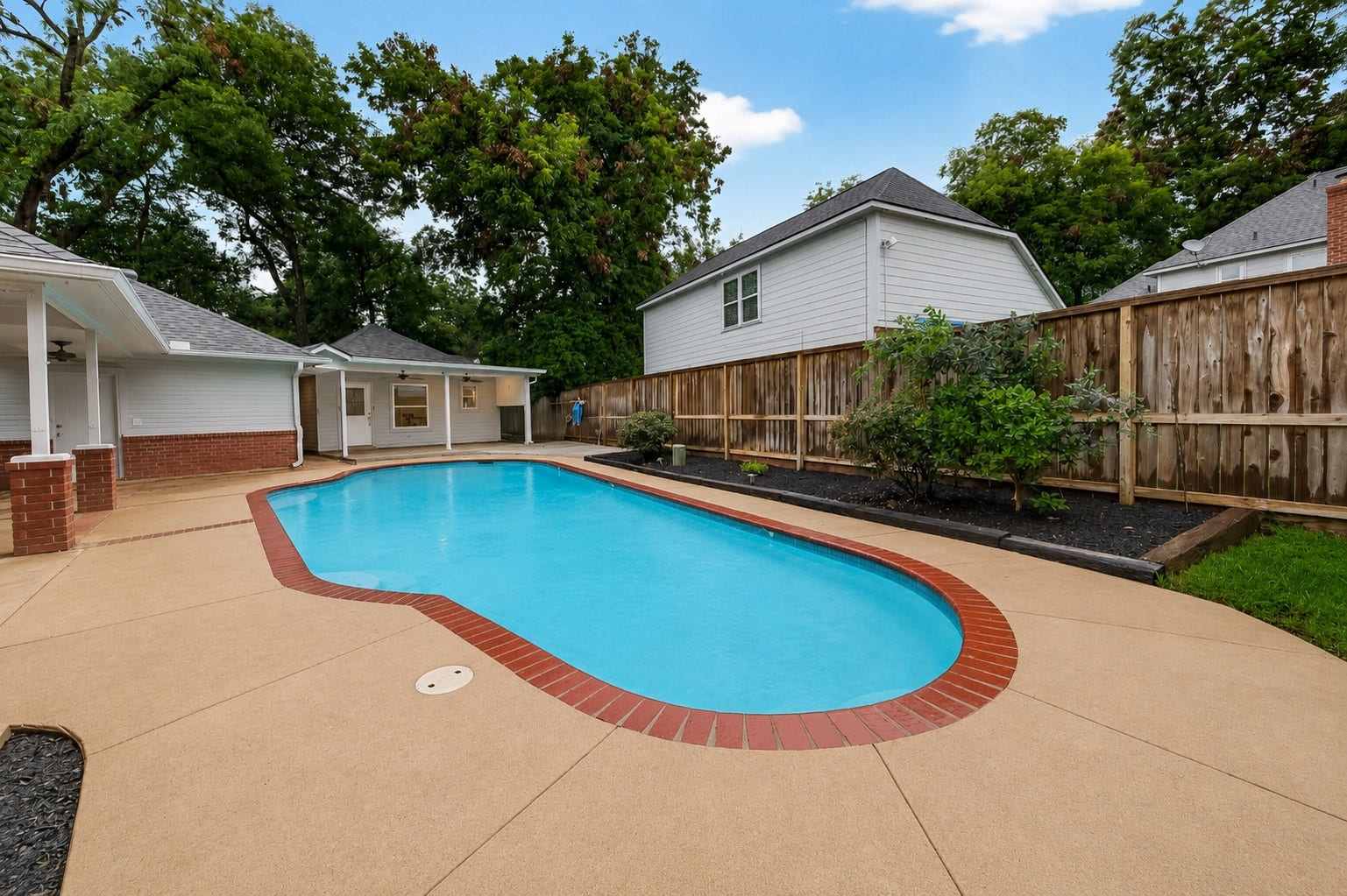 1410 Briar Green Court, Richmond, TX 77406 Sparkling Swimming Pool with extensive decking surrounding it!