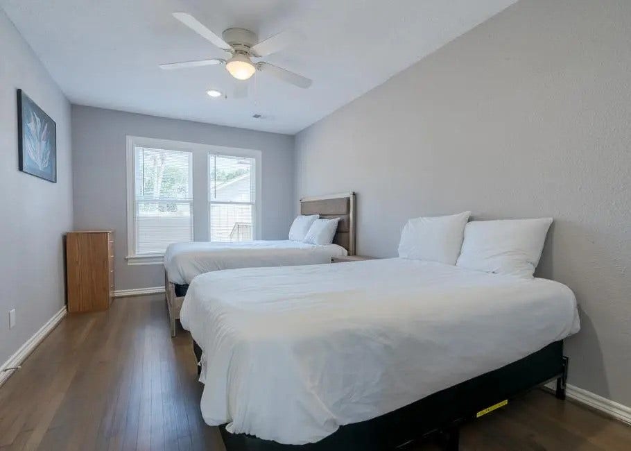 1408 Bowie Drive, Galveston, TX 77551 Bed is for staging, not for sale. Bedroom 2 different angle