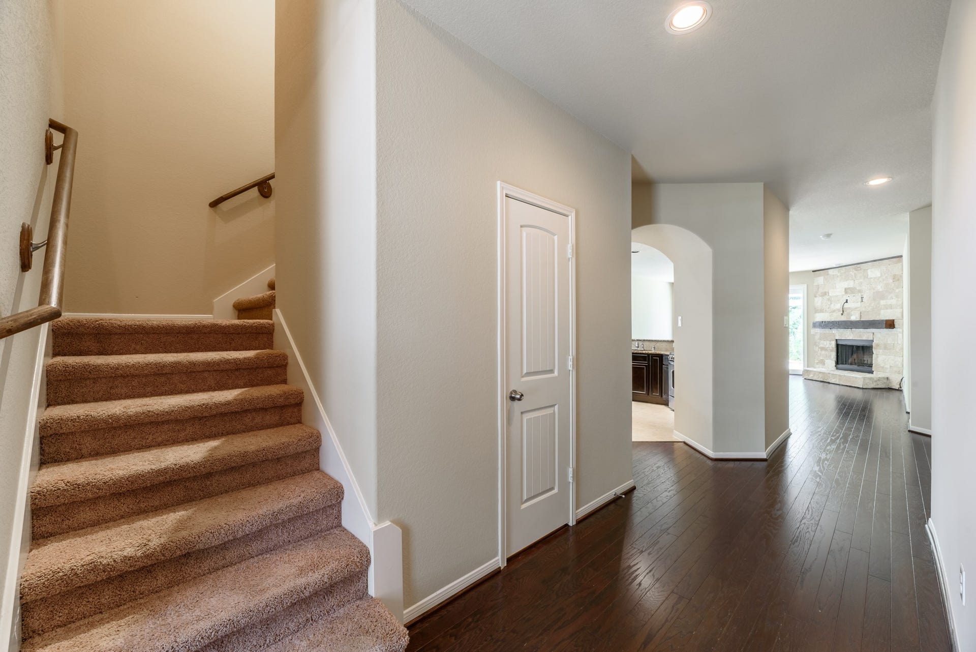 202 Black Swan Place, Magnolia, TX 77354 View from the front entry looking towards the stairs leading to the Gameroom, secondary bedroom & full bath.